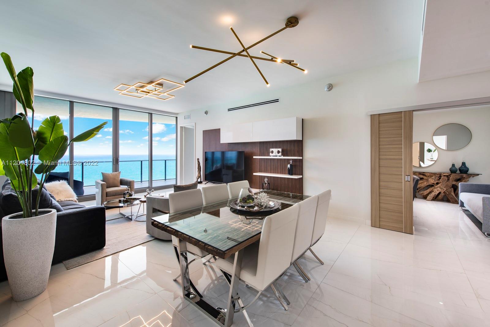 Luxury stunning brand new apt at the amazing Ritz-Carlton Residence at Sunny Isles Beach. Enjoy forever direct waterfront view of crystal clear blue ocean from every room. Large terrace. 2bs+den/2.5bth. Comes fully furnished. Private elevator foyer. Kitchen with European appliances, stone countertops, imported Italian cabinetry, marble accented baths Designed by Arquitectonica and interiors by Italian designer Michele Bönan. Unsurpassed amenities include: concierge, valet, restaurant & room service, beach & pool services, 2 swimming pools, hot tub, movie theater, oceanfront gym and Spa, wine lounge, game room, complimentary continental breakfast every day and much more. Ritz Carlton has no limits to offer its residents an extraordinary lifestyle. Offered "turn-key" fully furnished.