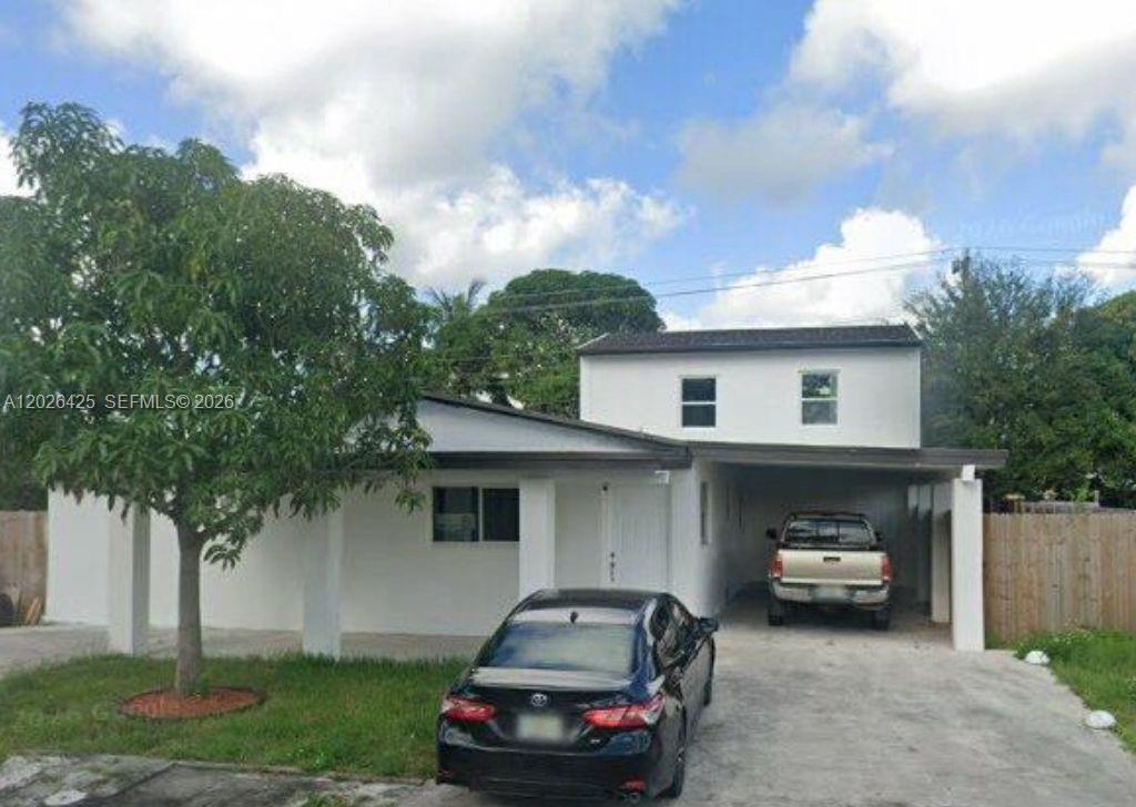 Great Opportunity to own income property,  4-bedroom, 3-bathroom 2 half of bathroom, located in Miami Gardens. Featuring brand-new flooring throughout and modern kitchens with sleek quartz countertops, this home blends style and comfort. The home offers comfortable living areas and a great backyard ideal for entertaining, family gatherings, or adding a pool. Good for big families who still want a little privacy,  3 units: first is 2/1/1, second is 1/1/1, third is 1/1/0. NO HOA, A truly move-in ready gem in a great location, just 2 miles from Hard Rock Stadium.  Good for AIRBNB. Please use Showing Time requests to set viewing appointments. Schedule your showing today.