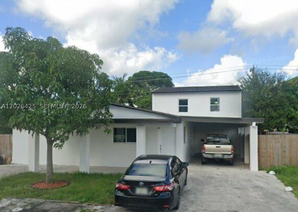Great Opportunity to own income property,  4-bedroom, 3-bathroom 2 half of bathroom, located in Miami Gardens. Featuring brand-new flooring throughout and modern kitchens with sleek quartz countertops, this home blends style and comfort. The home offers comfortable living areas and a great backyard ideal for entertaining, family gatherings, or adding a pool. Good for big families who still want a little privacy,  3 units: first is 2/1/1, second is 1/1/1, third is 1/1/0. NO HOA, A truly move-in ready gem in a great location, just 2 miles from Hard Rock Stadium.  Good for AIRBNB. Please use Showing Time requests to set viewing appointments. Schedule your showing today.