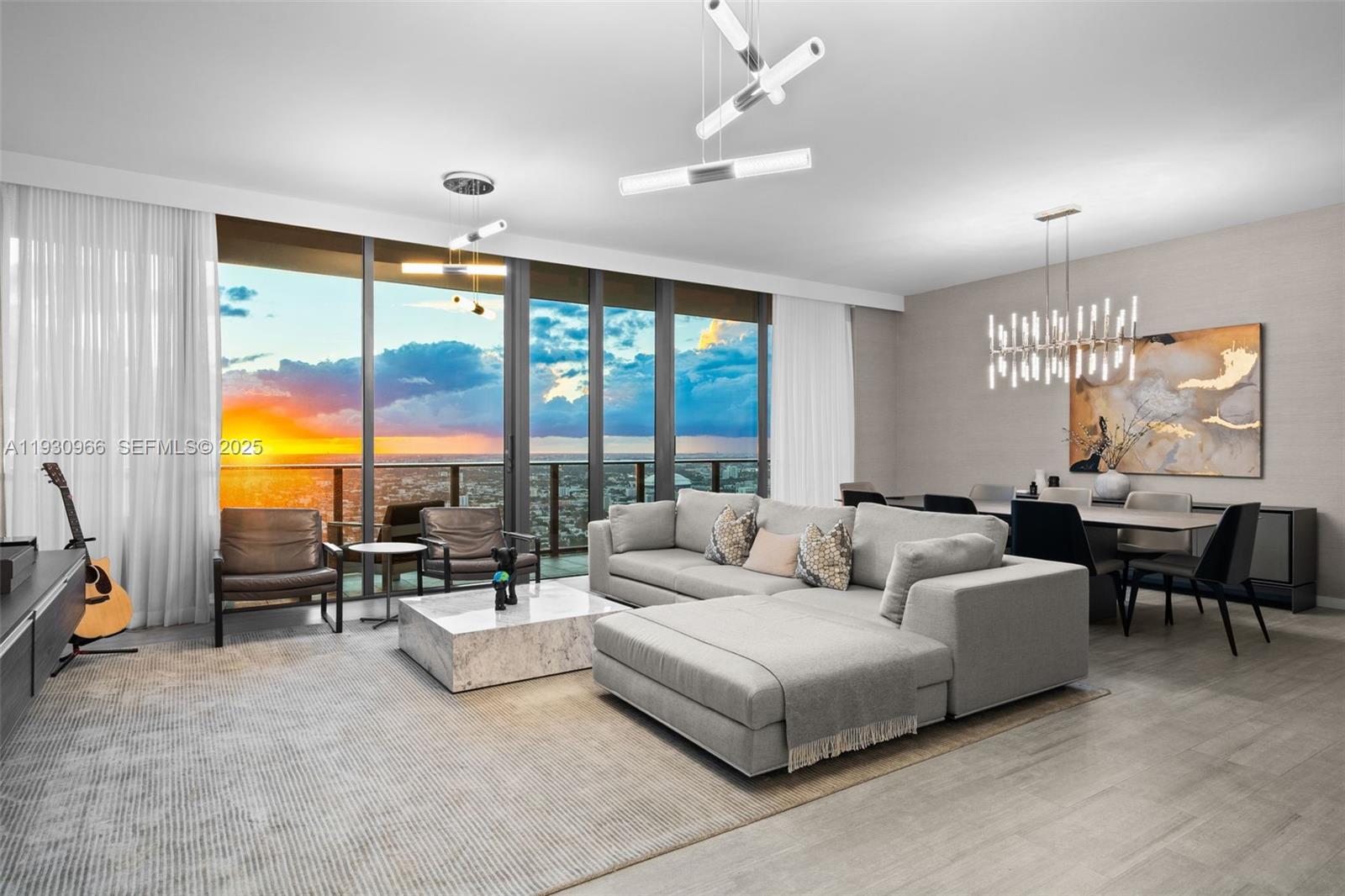 Penthouse 5904 at Brickell Flatiron offers a rare opportunity to own a truly exceptional turn-key residence high above the heart of Brickell. Perched on the 59th floor, this penthouse enjoys unparalleled, unobstructed sunset views stretching as far as the eye can see, delivering an elevated living experience for which the Flatiron is renowned.
The residence is one of the largest in the building with the most ample floor plan, offering 2,418 square feet of interior space with 4 bedrooms, 4 full bathrooms, and 1 half bath. Professionally designed and furnished by renowned interior designer Steven G, the unit features curated finishes, refined textures, and a cohesive modern aesthetic throughout. Offered fully furnished, the residence has had only one owner and has been used sparingly as a second home, presenting in pristine, like-new condition.
Developed by acclaimed builder Hugo Colombo, Brickell Flatiron is celebrated for its uncompromising construction quality, architectural sophistication, and one of the most impressive amenity collections in Miami. Residents enjoy resort-style indoor and outdoor amenities, world-class fitness and wellness spaces, and a level of service that defines luxury urban living.
The offering includes two assigned parking spaces and valet, adding both convenience and value. This penthouse reflects thoughtful design, comfort, and sophistication—ideal for a discerning buyer seeking a turnkey luxury home in one of Brickell’s most iconic towers.