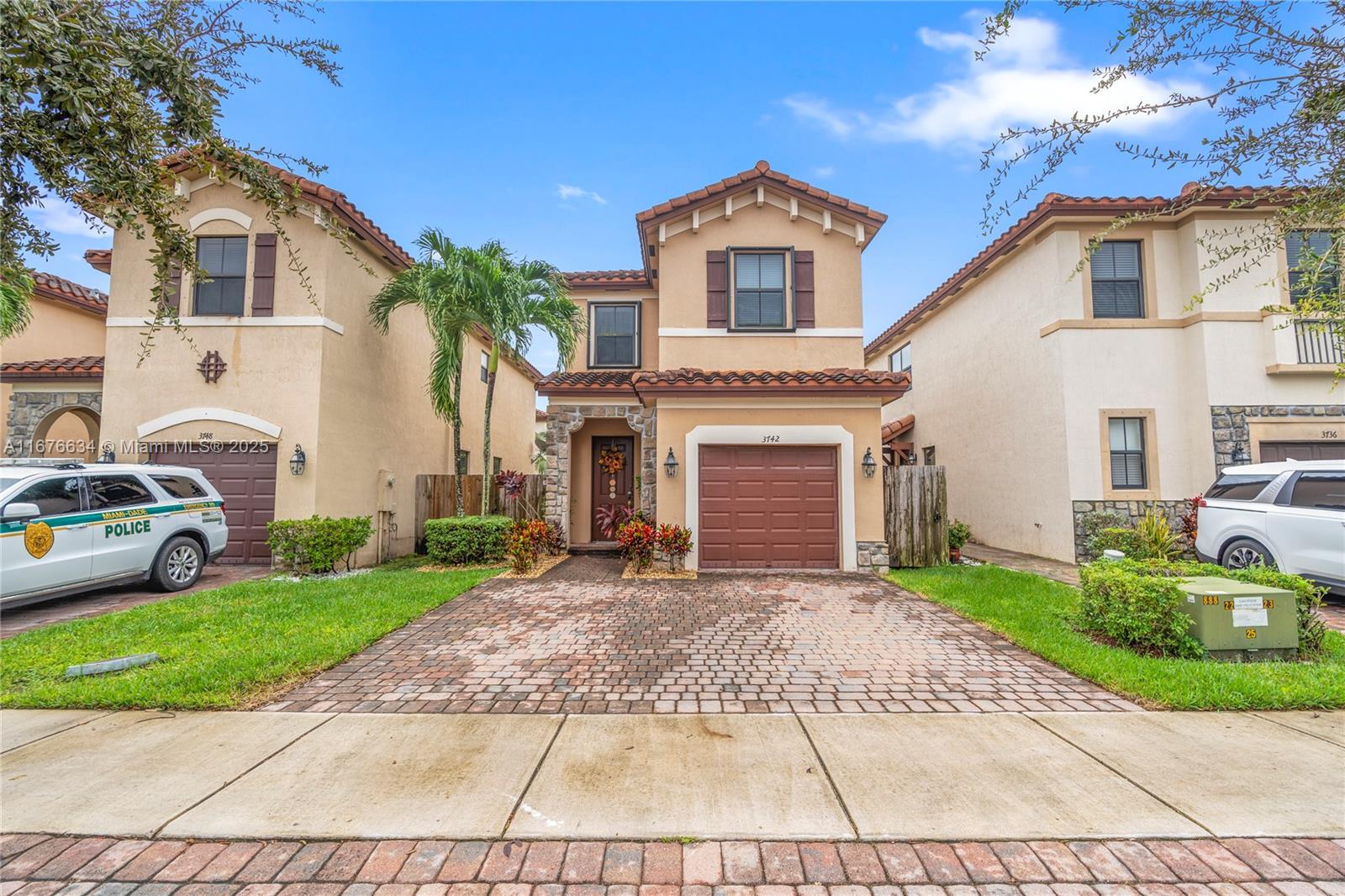 This well-maintained detached home features a practical open floor plan, perfect for modern living. Located in a secure gated community, this two-story residence includes stainless steel appliances and a breakfast bar, seamlessly connecting the kitchen to the dining and living areas, making it an excellent space for gatherings. Upstairs, you’ll find a comfortable master suite with a walk-in closet and en-suite bathroom, plus two additional bedrooms. The backyard serves as an ideal setting for relaxation or entertaining. One car garage PLUS additional space on paved driveway for two more vehicles. Conveniently located between three major landmarks —Homestead-Miami Speedway, Reserve Base, and Baptist Hospital.  Assumable VA loan  w/very low interes rate - inquire for details.