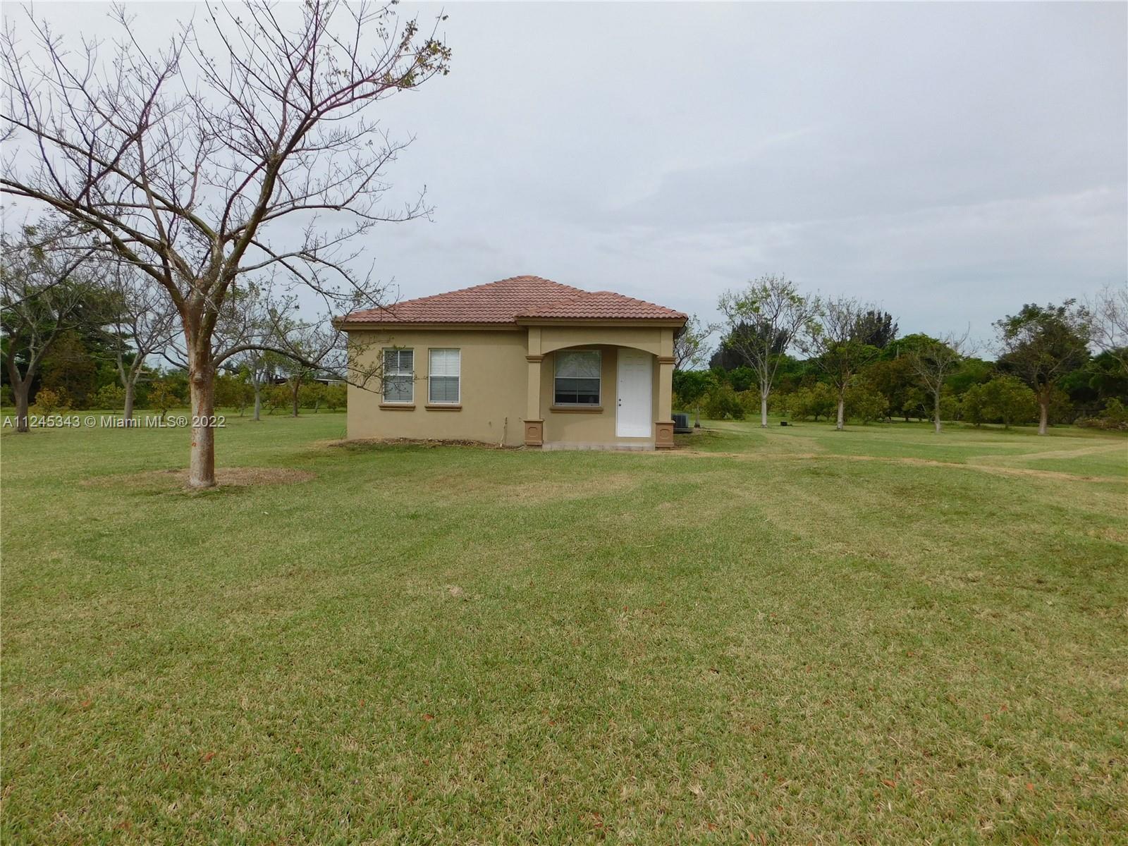BEAUTIFUL GUEST HOUSE 1100 SQ FT HOME IN THE COUNTRY.  SITTING ON A 4500 SQ FT LOT. REDLAND AREA 2 BEDROOM  1 BATHROOM...  ELECTRICITY, WATER, LAWN MOWING AND LANDSCAPING, INCLUDED.  TILE THOUGHOUT, OPEN PATIO.
