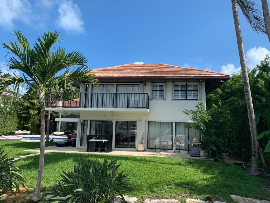 Enjoy living in this large canal front home located on a quiet cul de sac or remodel this beauty to your taste. This home offers privacy, open views, access to the canal and large windows that makes the residence bright and light. Residence has 5 Bedrooms, including maid's quarters, lots of closets, high ceilings and steam sauna. The lovely backyard area with an oversized pool is perfect for entertaining. 100ft sea wall with capacity for a large yacht and easy access to Biscayne Bay, a true yachtman paradise! Two car garage with A/C and two car carports