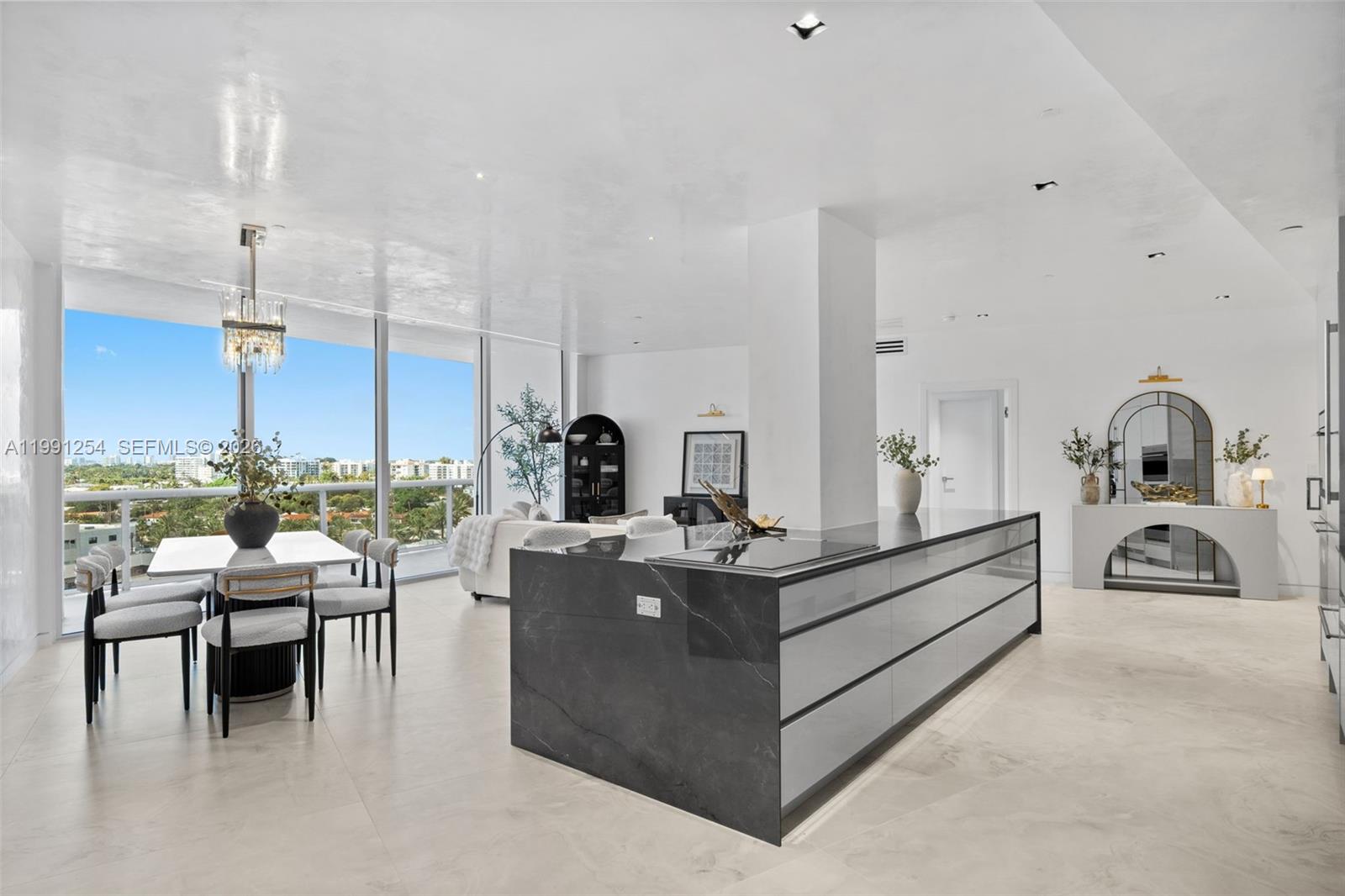 Completely renovated 3-bedroom, 3.5-bath residence at the prestigious Majestic Tower in Bal Harbour, offering 2,250 SF of modern luxury. This turnkey unit features a bright open layout with floor-to-ceiling windows, spacious living and dining areas, and a wraparound balcony showcasing beautiful open views.
Sleek chef’s kitchen with custom cabinetry, premium appliances, and oversized island. Wide-plank flooring and high-end finishes throughout.
Opportunities like this are rare—contact us today to schedule your private showing.