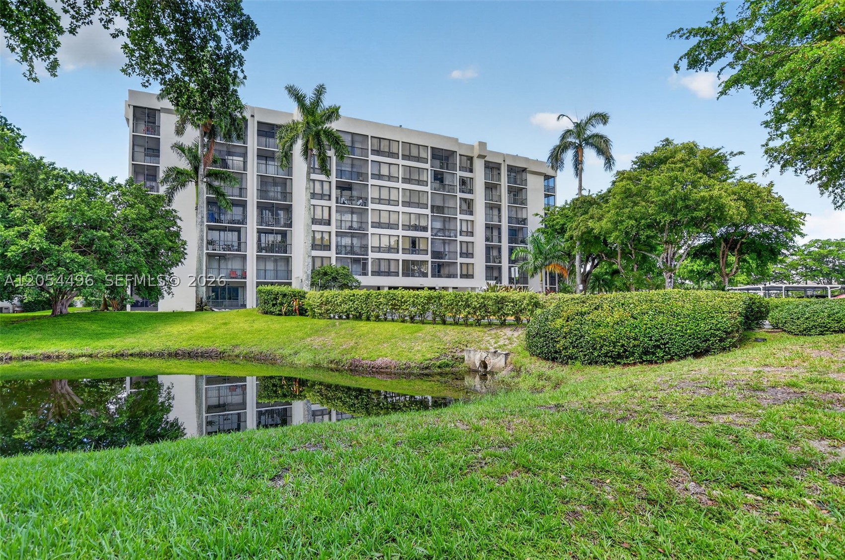Bright, beautifully updated, and move-in ready! This spacious 2-bedroom, 2-bathroom condo is located in a quiet and desirable Boca Raton community. The home features hurricane-impact windows, expansive floor-to-ceiling glass, and sliding doors opening to a private balcony. The kitchen has been refreshed with brand-new cabinetry and new appliances, while both bathrooms feature updated vanities. Additional highlights include generously sized bedrooms, an in-unit washer and dryer, and no carpet throughout. One assigned covered carport space is included, along with additional guest parking. Low maintenance fee of $654 per month, paid quarterly. Conveniently located near highly rated public schools, shopping, dining, and major roadways.