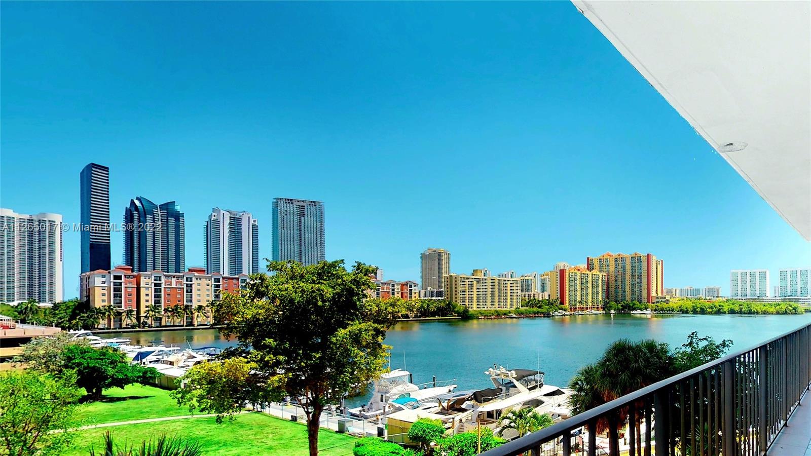 Over 1500 SF & 3 Blocks to the ocean. Bright, clean, & freshly painted, ready for occupancy. The only Winston Tower that can rent immediately ($3400-$4000/mo), no waiting period. Undeniably gorgeous views from every room, overlooking the Intracoastal, the park, & the Sunny Isles skyline.  Spacious 2 bed features a 35 ft balcony, NEW hurricane impact thermal doors & windows, TWO parking spaces, & extra STORAGE space. Premium Cable/HBO/wifi & Total Appliance warranty included in low HOA fee. A+ schools & central location, walking distance to everything- shopping, food & worship. Surrounded by premium condos and waterfront homes, the value is undeniable. Finishing 40 yr recert, will be painted white, w/ new pool deck. Amenities: gym, tennis, valet, security, & concierge.Assessment paid.