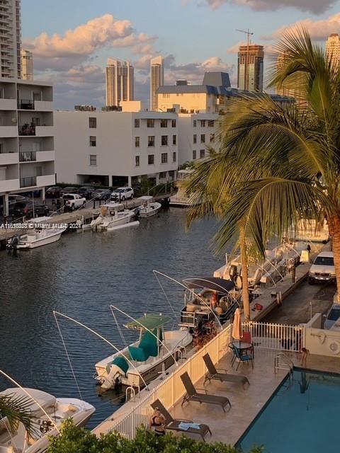Lovely remodeled waterfront 1 bedroom and 1.5  bathroom in exclusive Eastern Shores just off Intracoastal Waterway. Travertine marble floors, Stainless steel app, granite tops, new AC.  Guard gate 24/7. Walk to shopping, dining, theatre.  spectacular water view from your spacious balcony, huge living Area.Well maintained building with Manager on site. New sauna, pool, BBQ, party room, gym, warm lobby, security cameras and elevator. Friendly building and neighbors. Water, trash, and cable included. and common dock.