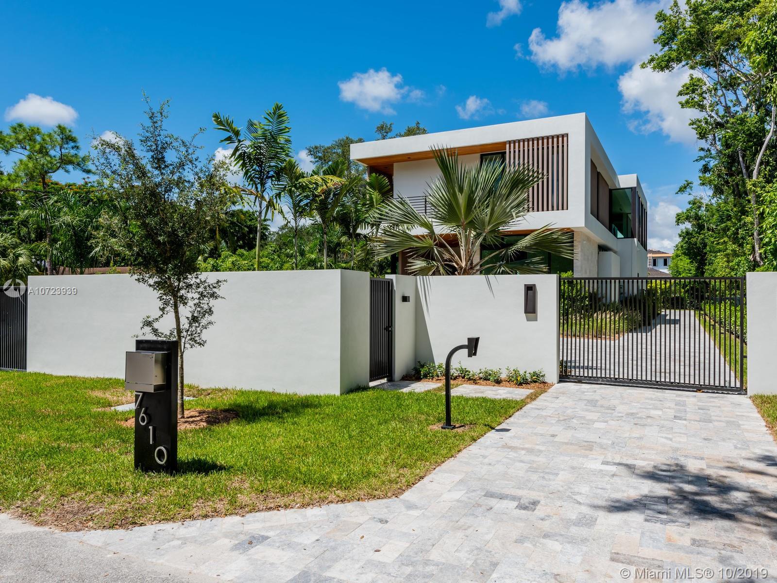 New tropical oasis in Ponce-Davis area. Designed by renowned architect Cesar Molina CMA Studio and executed with top finishes. Located on quiet dead-end street, this modern home sits on a 24,000+ sqft lot. Has 6 bed/6.5 baths and the best amenities: Elevator, pool with shallow beach + waterfall wall + Jacuzzi, Terrace with summer kitchen, 2nd family room upstairs, laundry room, dedicated office space, and large rooftop terrace with pool views & access to pool deck, adds 1,668 sqft of entertainment space. Italkraft kitchen with dining isle that sits 9. Sub-Zero appliances, wine coolers & Wolf range. Designer bathrooms with fixtures by Hansgrohe, Duravit & Jacuzzi. Built-in security system & much more! Stunning combo of family home and entertainer’s dream. Beautifully staged. A must-see!