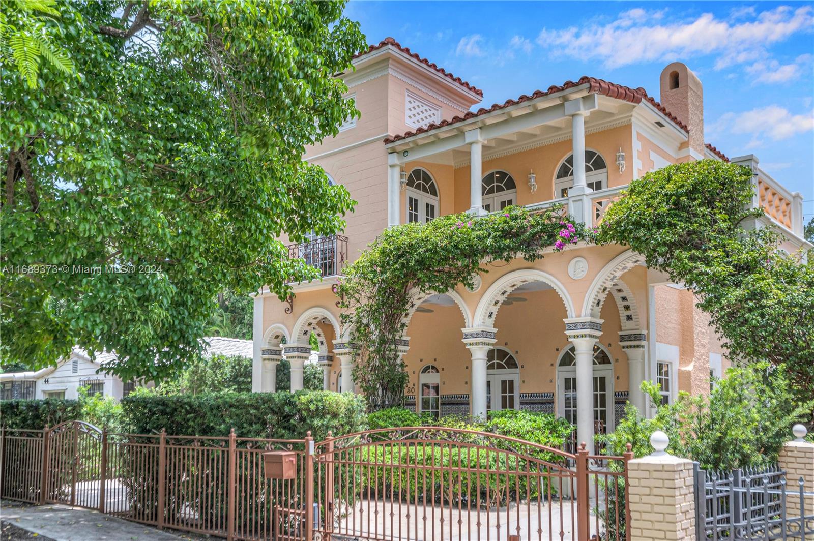 Experience luxury living at the former Spanish Consulate, a smart home just two blocks from Miami's renowned Design District. This 5-bedroom, 4.5 bath masterpiece comes fully furnished with high-end designer furniture and includes a versatile "casita," a splash pool, and two master suites with private terraces, blackout shades, and walk-in closets. Enjoy soaring double-height ceilings, cutting-edge smart home technology with phone-controlled access, SONOS, security, and climate settings. Steps away from the Design District’s upscale shopping, art galleries, dining, and cultural experiences, this home offers unmatched convenience and style. Gated parking and flexible lease terms make it a perfect turnkey residence in one of Miami's most vibrant neighborhoods. A must-see!
