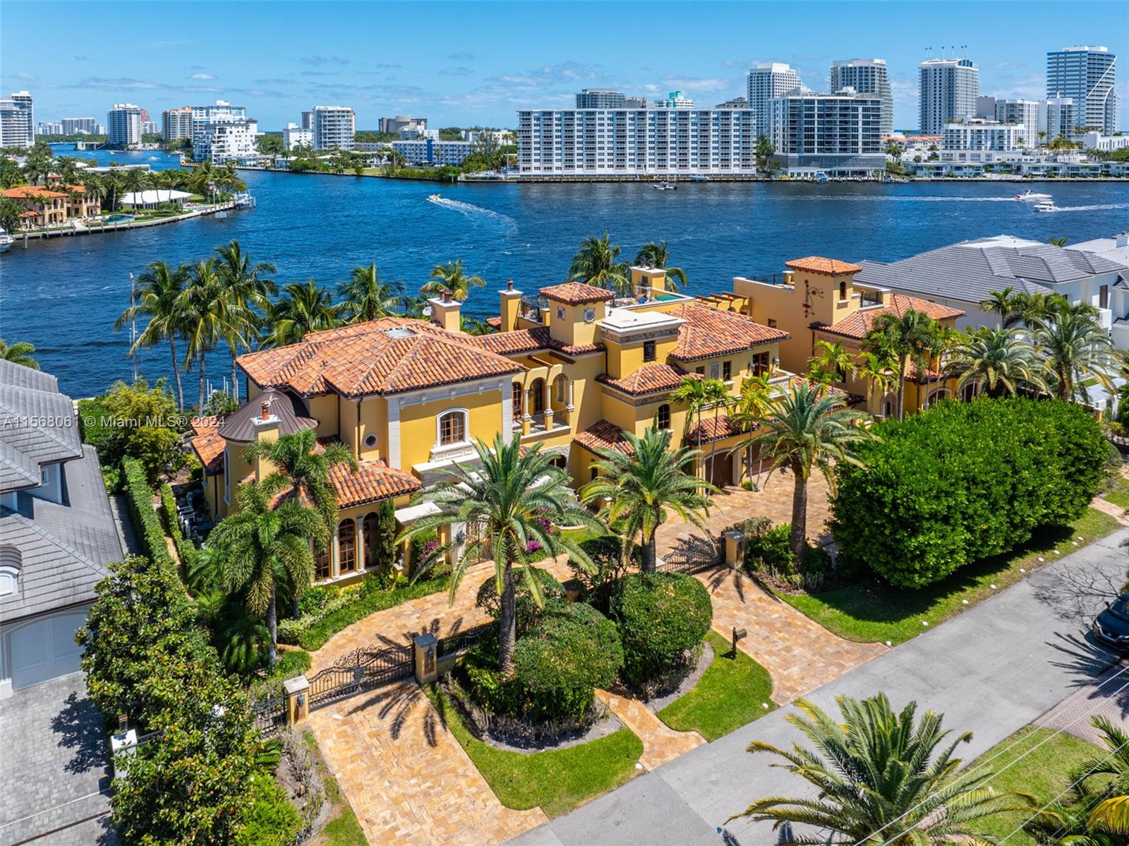 This 2004 custom-built yachter’s palace spares no expense, sprawling over 12,000 sq ft on a 24,000 sq ft prime waterfront property. With 200 ft of straight waterway dockage, it caters to elite water enthusiasts, offering endless wide-open water views. A legacy estate built from the finest materials, this trophy masterpiece features 8 bedrooms, 10 bathrooms, an executive office, den, bar, wine room, estate-sized kitchen, butler’s pantry, two elevators, three laundry rooms, a theater, gym with sauna and steam room, six powder rooms, and multiple fireplaces. Ample parking for about 30 vehicles including 6 garages. The property boasts multiple rooftop terraces, an outdoor kitchen, and a custom, oasis lagoon-style private pool, completing this unparalleled offering in luxury and grandeur.