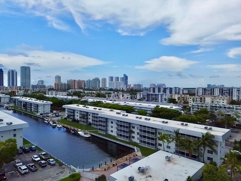 Experience the ultimate waterfront boating lifestyle in prestigious Eastern Shores without the luxury price tag! Located in the ultra-quiet 55+ Eden Isles community, this rare, first-floor garden home allows you to skip the elevators and walk straight into your move-in-ready oasis.
THE RESIDENCE: Fully remodeled kitchen with wood cabinetry, granite counters & premium Bosch appliances.  Peace of mind: Brand-new 2025 A/C (with warranty) & high-impact entry door/bedroom window.  Custom closets, updated lighting, and extra storage available. Screened balcony overlooking the wide 85-ft canal—always cool and shaded with no direct sun!
THE BUILDING & ISLAND, Sits on a non-flooding, private island with a single entry point.  Passed 50-year certification! Major upgrades include: new metal roof (50-yr warranty), restored seawall, new elevator, updated floors, new security cameras, and enhanced landscaping. Bring your boat! Dockage available to rent or purchase.
LIFESTYLE & AMENITIES: Resort-style heated pool, clubhouse, new gym w/ showers, sauna, BBQ, theater & billiards. Low HOA includes water, high-speed internet, cable, reserves & monthly pest control. Free community shuttle. Walking distance to the beach, shopping, and dining. Surrounded by ultra-luxury neighbors like Williams Island and Acqualina.
Perfect snowbird retreat! HOPA 55+. One rental per year allowed after the 1st year of ownership. 3-D Virtual Tour & floor plan available—contact listing agent!