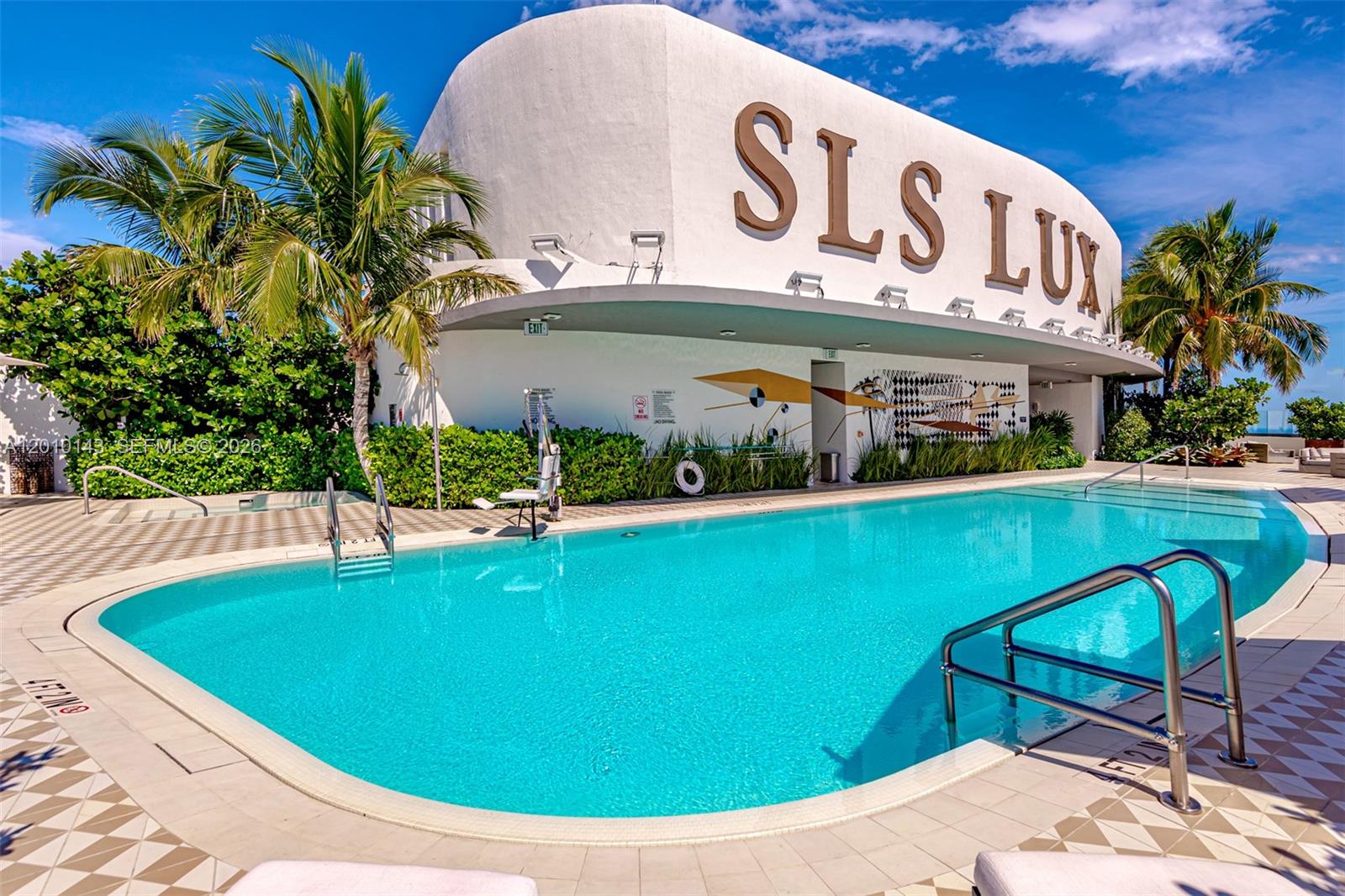 Perched on the 25th floor at the prestigious SLS Lux Residences, Unit 2505 offers elevated luxury living with sweeping Northeast views of Biscayne and Brickell skyline. This sophisticated 2 bedroom, 2 bath residences spans 1,152sqft and features floor to ceiling impact windows. Enjoy your day on your expansive wrap around balcony, unwinding or entertaining above the city.  The sleek chef's kitchen is outfitted with premium Wolf, Sub-Zero and Asko appliances and striking granite counter tops. Italkraft cabinetry, garbage disposal, combing elegance and functionality. Porcelain flooring flows throughout the residence, complimented by a modern touch control system designed for effortless luxury and convenience. Located in the heart of Brickell , SLS Lux offers world -class amenities, resort-style living, and unmatched access to Miami finest dining, shopping, and nightlife