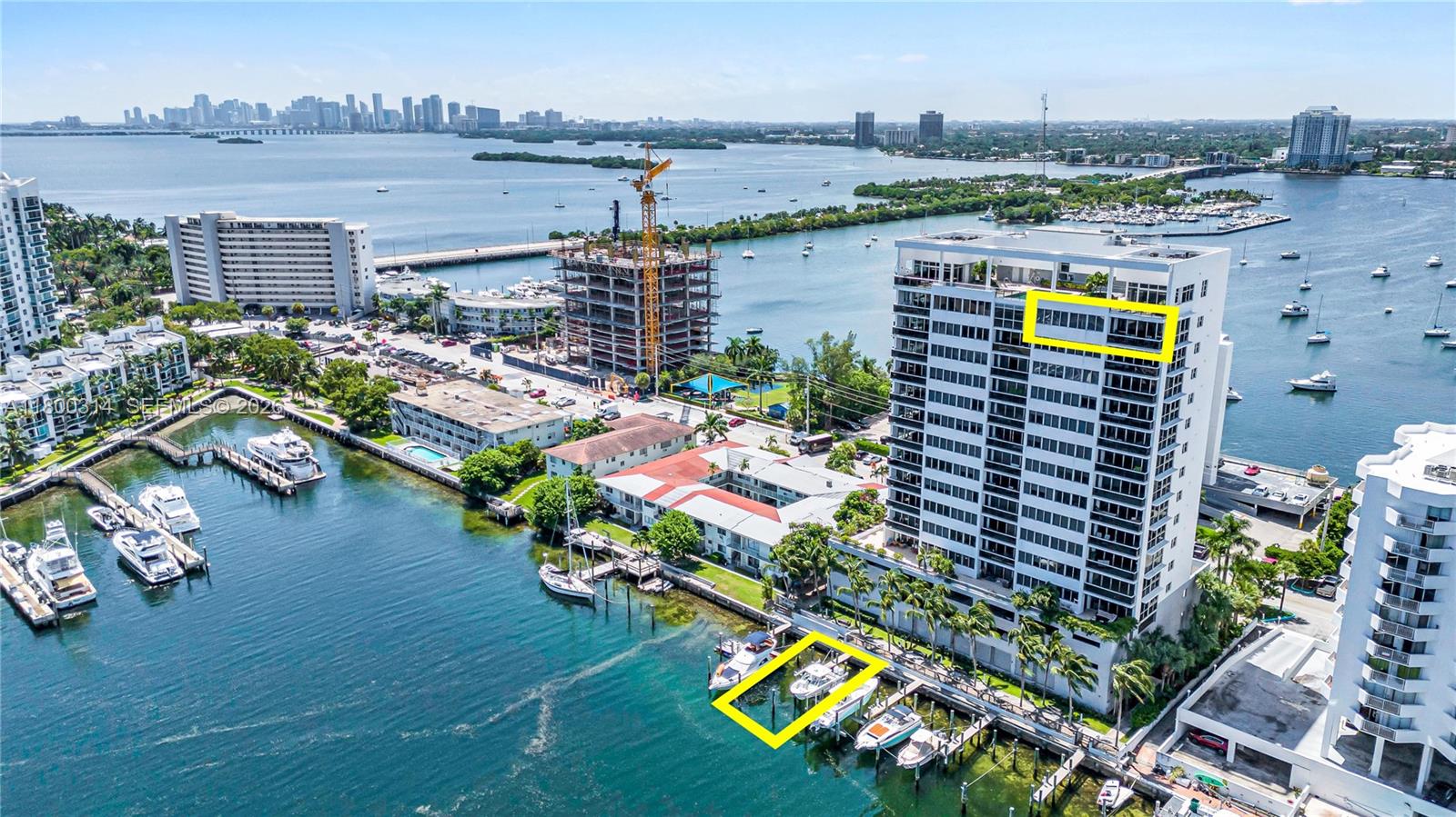 PRICE INCLUDES A DEEDED BOAT SLIP WITH LIFT.
3BR | 2 Full Baths | Flow-Through Penthouse | 2,065 SF
Rare corner penthouse in North Bay Village offering unobstructed East, West & North views toward Sunny Isles. This expansive flow-through residence features marble floors, an oversized primary suite with walk-in closet, and abundant natural light. Two assigned parking spaces included. Boutique building with only 33 residences offering a rooftop pool, gym & BBQ area. Built in 2005 and fully compliant with Florida’s updated condo reserve and insurance requirements.Included: privately owned, deeded dockominium (separate from HOA) with a 16,000-lb lift accommodating boats up to ~45’. Private FPL meter, water included, and prime bay access across from the upcoming Pagani project. Ideal for personal use or income.