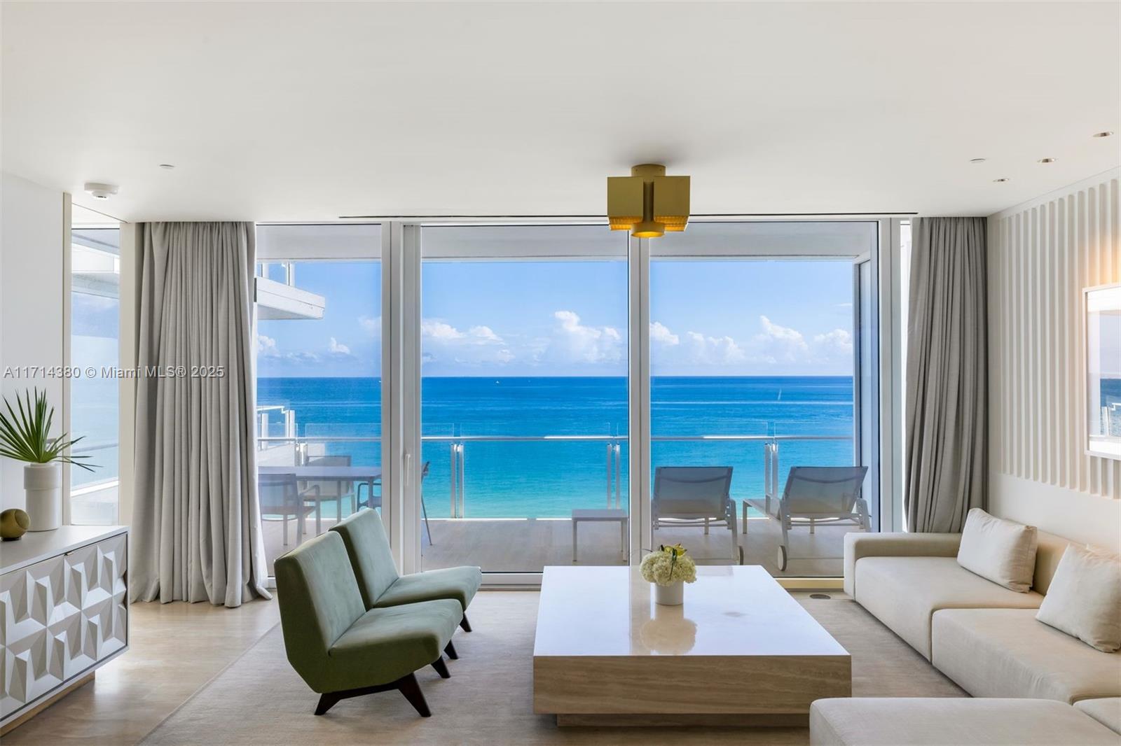 This sophisticated  ocean facing 1-bedroom + den, 2.5-bath hotel residence at the Four Seasons Surf Club offers sweeping, unobstructed views of the Atlantic Ocean and comes impeccably furnished by renowned French interior designer Joseph Dirand. Designed by the iconic, Pritzker Prize-winning architect Richard Meier, the building is set on 9 acres of prime land, with over 800 linear feet of stunning ocean frontage. Residents enjoy access to the residents-only amenities including the fitness centers & pool. Property Features & Amenities include four pools, beach access, Spa, two signature restaurants The Surf Club Restaurant by Thomas Keller, services including, in-room dining, housekeeping & provisioning as well as dedicated staff of Residential Concierges, Valet