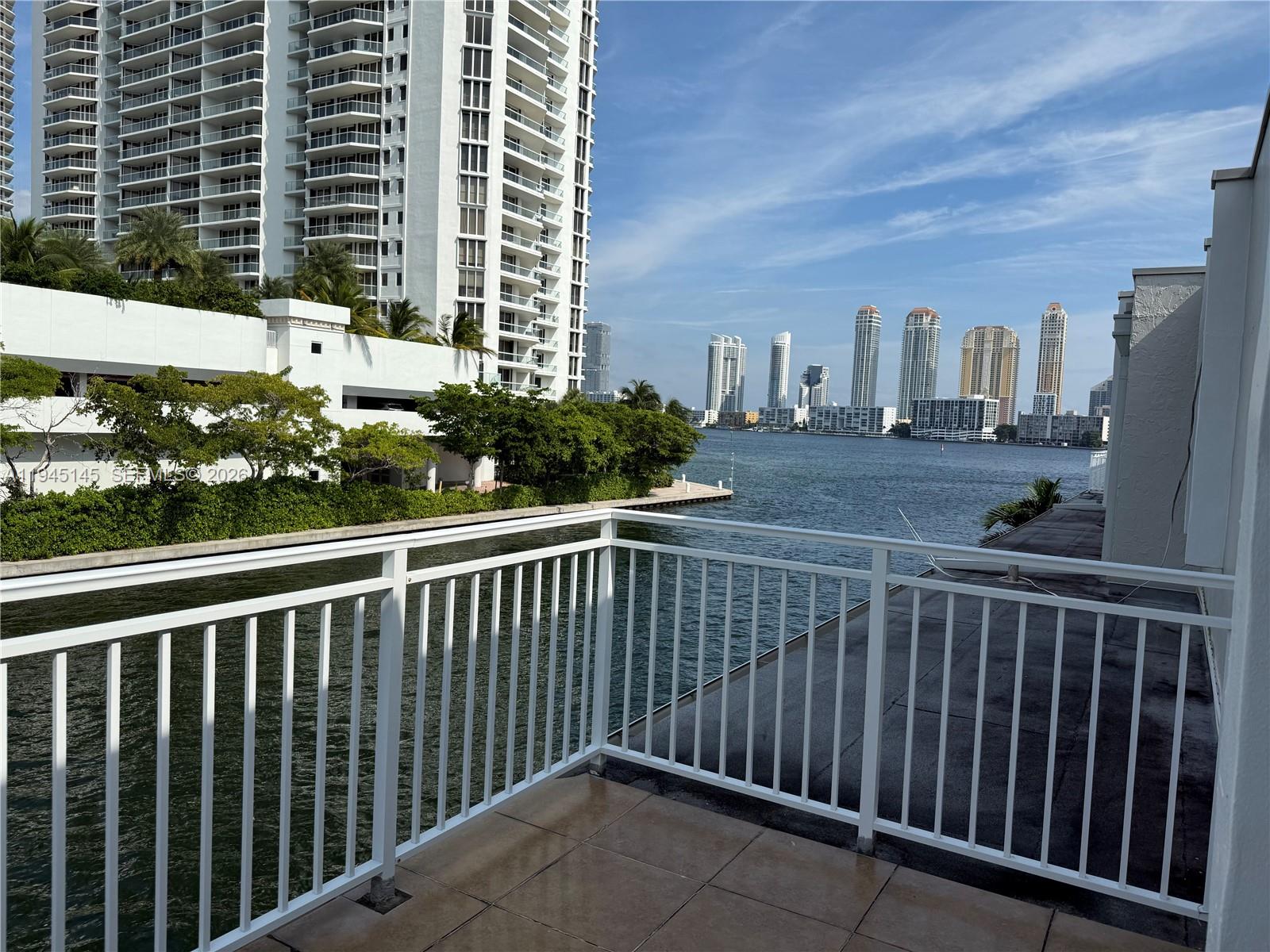Beautiful 2bd/br two story townhouse on the water in Eastern Shores. Large spacious, bright living space. Waterfront balconies. 1 assigned parking and 1 guest. Pets welcome.