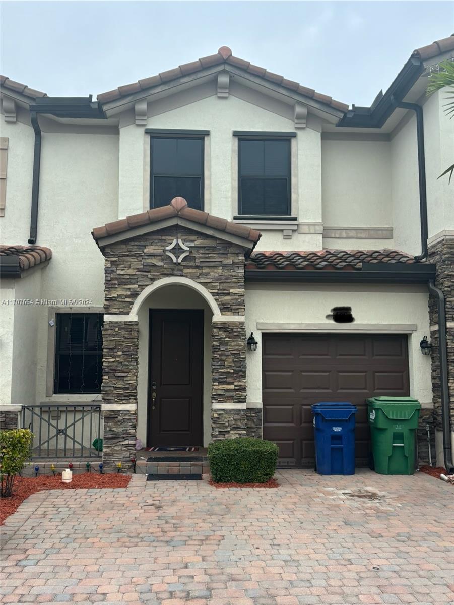 Beautiful townhome 3/2.5  in Artesa a gated resort style community. The home features stainless steel appliances, title floors & carpet upstairs, back yard pavers, Community pool, gym, basketball court, and kids playground. Easy access to 248 st. very closet to the Turnpike, supermarkets, bank, schools and shopping. Easy to show.