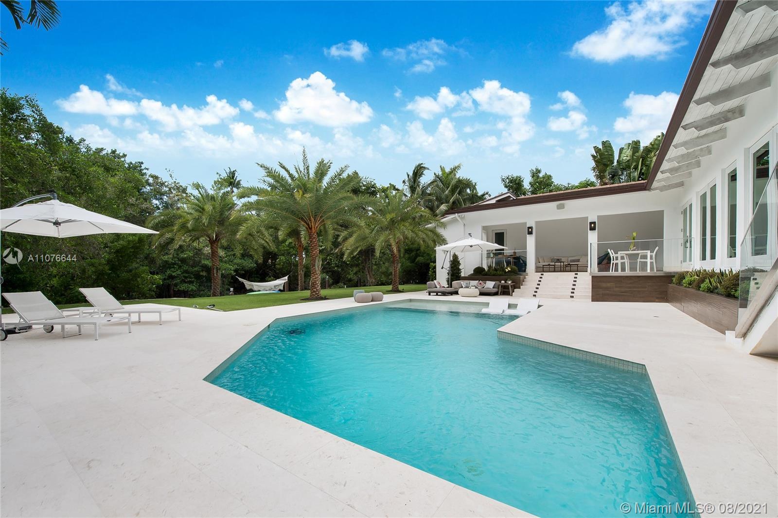 Newly renovated waterfront home nested in the gorgeous gated community of Cocoplum. This luxurious home includes 5 bedrooms, 6.5 bathrooms, 2 separate rooms for office and/or family use, with marble flooring throughout. The main bedroom offers private access to a beautiful outdoor space and pool. The gas stove kitchen boasts top of the line appliances, a spacious breakfast area and custom-made cabinets. An enclosed 2 car garage and 80 foot dock are sure to please the most passionate car and boat enthusiasts. Located within a ten minute drive of the best schools in Miami, gourmet restaurants and live entertainment, this waterfront property is the ideal family home while offering the best entertainment Miami has to offer and direct access to the open seas.