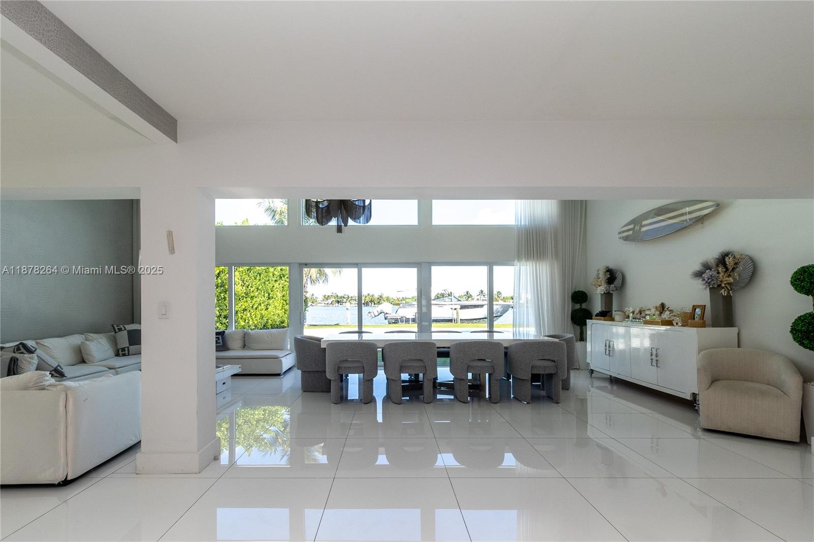 Welcome to Biscayne Point, one of Miami Beach’s most exclusive gated communities! This rare waterfront property offers 75 ft of open bay frontage with stunning views and direct ocean access—perfect for boating and sunsets. Move-in ready with an oversized, grandfathered pool and spacious outdoor living area, it’s ideal for entertaining or relaxing in privacy. Endless potential: add a second story or build a new luxury estate on this exceptional lot. Just minutes from Bal Harbour, world-class dining, and pristine beaches, this home combines lifestyle, location, and investment in one of Miami Beach’s most desirable neighborhoods.