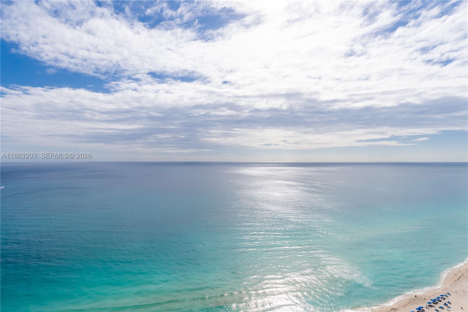 Lowest priced 01 line in the building! Enjoy the spectacular views that this high floor residence has to offer. Leased for $25,000/month until May 2027. 120 day termination clause.

Live in luxury at the world-renowned Acqualina Resort. This stunning 4-bedroom, 4-bath residence features two spacious private terraces with breathtaking ocean sunrises and city skyline sunsets. Floor-to-ceiling windows fill the open-layout interior with natural light, highlighting elegant finishes throughout. Enjoy 5-star resort amenities including 3 oceanfront pools, beach service, fine dining, spa, concierge, and exceptional staff. Private lobby entrance provides enhanced privacy. A rare opportunity for refined resort-style living.
ACQUALINA REALTY OFFICE ON SITE 24/7

Unit will be painted as mutually agreed upon between buyer and seller. 
Kitchen counter top will be changed to Taj Mahal level and mutually agreed upon between buyer and seller. 
Front door will be changed upon mutual agreement between buyer and seller.