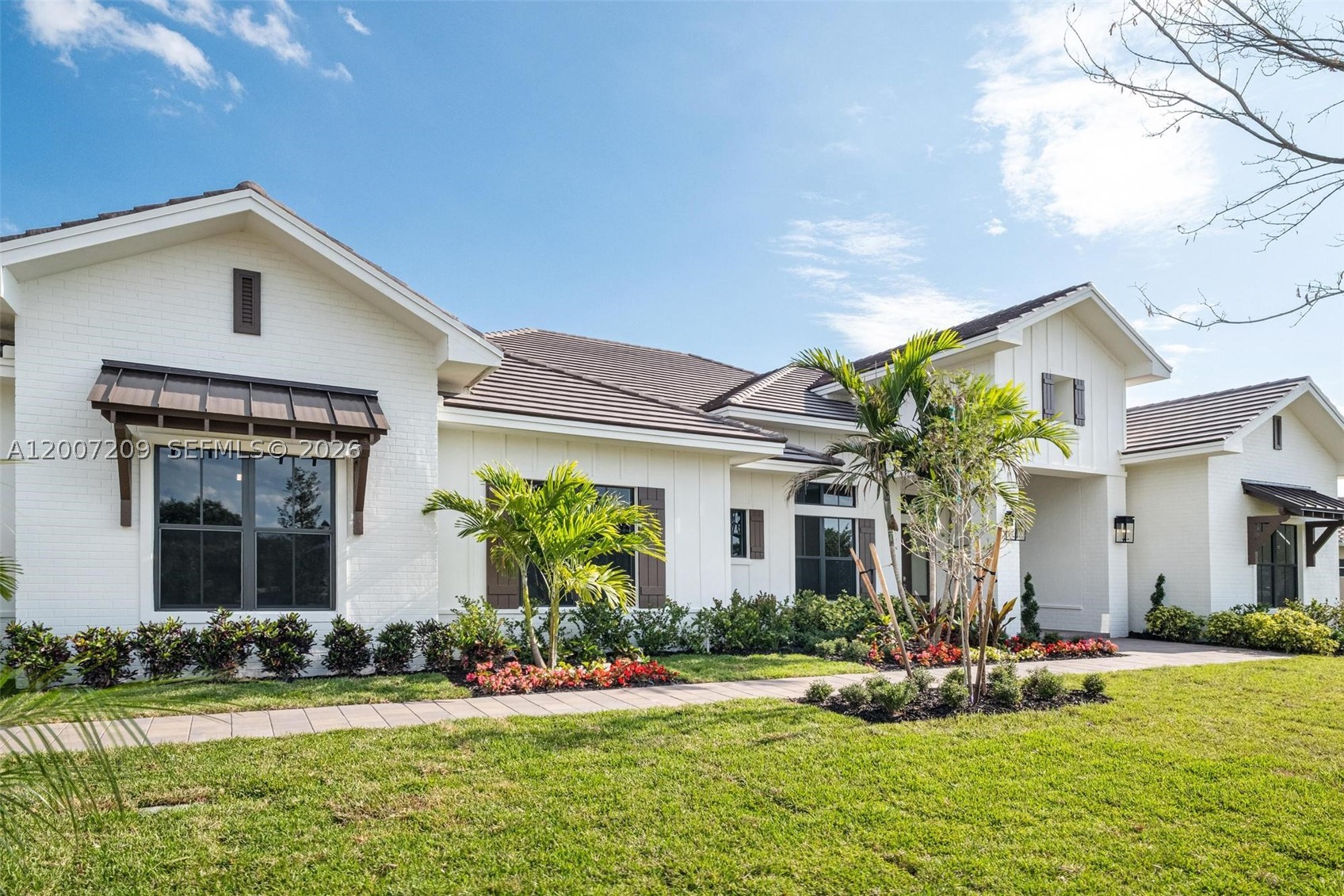 Introducing the LAUREL HOME — an extraordinary new luxury residence by renowned custom builder Lowell Homes, is located in the highly sought-after Flamingo Ranch Estates enclave of Davie. Perfectly positioned at the end of a quiet private cul-de-sac on prestigious Peaceful Ridge Trail, this exceptional one-story architectural masterpiece is surrounded by a collection of newly constructed luxury estates, all crafted with the signature quality and elegance Lowell Homes is known for. Set on an expansive 37,356 SF homesite with no HOA, this residence offers the ultimate blend of sophistication, privacy, and modern family living. The beautifully designed floor plan is thoughtfully curated for both everyday comfort and entertainment. The expansive living spaces flow seamlessly into the grand chef’s kitchen, formal dining room, family room and inviting breakfast nook. Designed to impress, the kitchen showcases top-tier JennAir appliances, premium quartz countertops & custom cabinetry. The private backyard retreat offers the ideal South Florida lifestyle with a luxurious pool, expansive covered entertaining areas, and lush surroundings that provide exceptional privacy rarely found in new construction. Located in the heart of Davie — one of South Florida’s most desirable equestrian communities — residents enjoy a unique blend of luxury estate living and country charm, with nearby equestrian trails & parks, fine dining and shopping. Exceptional private & public schools nearby.