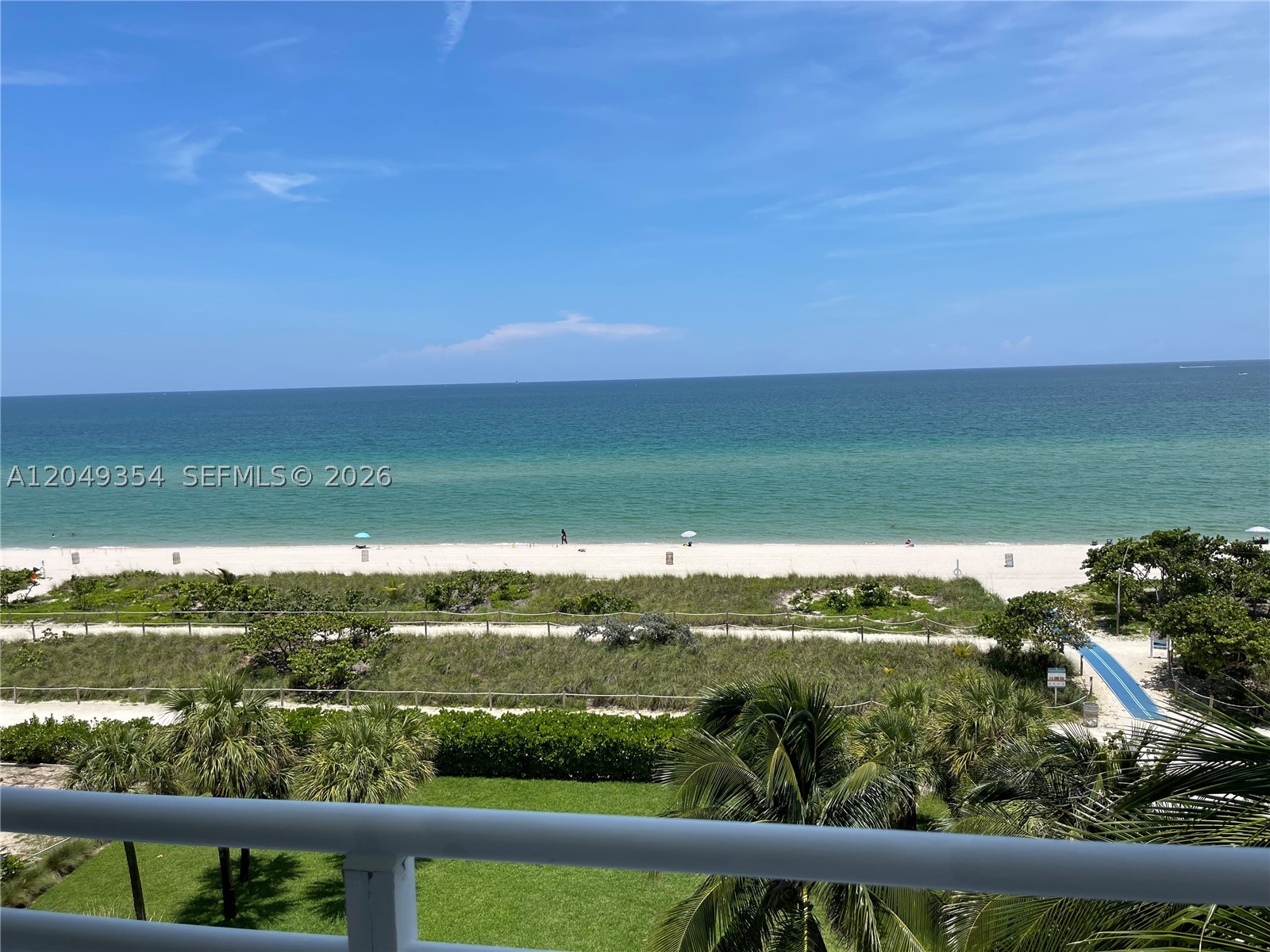 Million-Dollar Lifestyle Without the Million-Dollar Price Tag! Experience ultimate coastal luxury in this gorgeous, sun-drenched 2-bedroom, 2.5-bathroom condo. Featuring a bright, open floor plan and a modern open kitchen, the entire residence is flooded with brilliant natural light. Enjoy complete peace and privacy with a rare layout that features no neighboring units on either side. Step outside onto two expansive, wraparound balconies that seamlessly extend your living space, offering breathtaking, direct views of the turquoise ocean and stunning evening sunsets. For ultimate convenience, the unit includes an in-unit washer/dryer and two covered, assigned parking spots.Located in a charming, quiet, and highly walkable beach town, this oceanfront building grants you direct access to a pristine beach. The building's exceptional community amenities include a lap pool, a toddler pool, and full beach chair service.Walk to everything you need! You are just minutes away from downtown Surfside, the glamorous Bal Harbour Shops, gourmet restaurants, supermarkets, top-rated schools, places of worship, two beautiful public parks, and three nearby dog parks. This pet-friendly paradise truly offers it all.