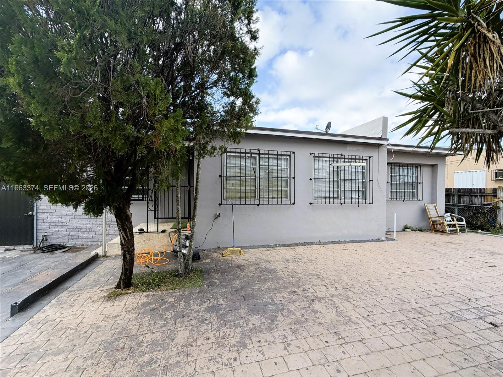 Multi-family Zoned property located at 430 NW 53 Ave, Miami, FL 33126, featuring a 2-bedroom, 1-bath main home plus two additional side units, offering excellent income-producing potential. Situated on a 7,318 sq ft lot in a highly desirable and centrally located neighborhood. Conveniently located near Miami International Airport, major highways, shopping, dining, and public transportation, making this property attractive for both tenants and owner-occupants. Perfect opportunity to live in one unit and rent the others or maximize rental income in a prime Miami location. Strong investment potential in the sought-after Flagami area.