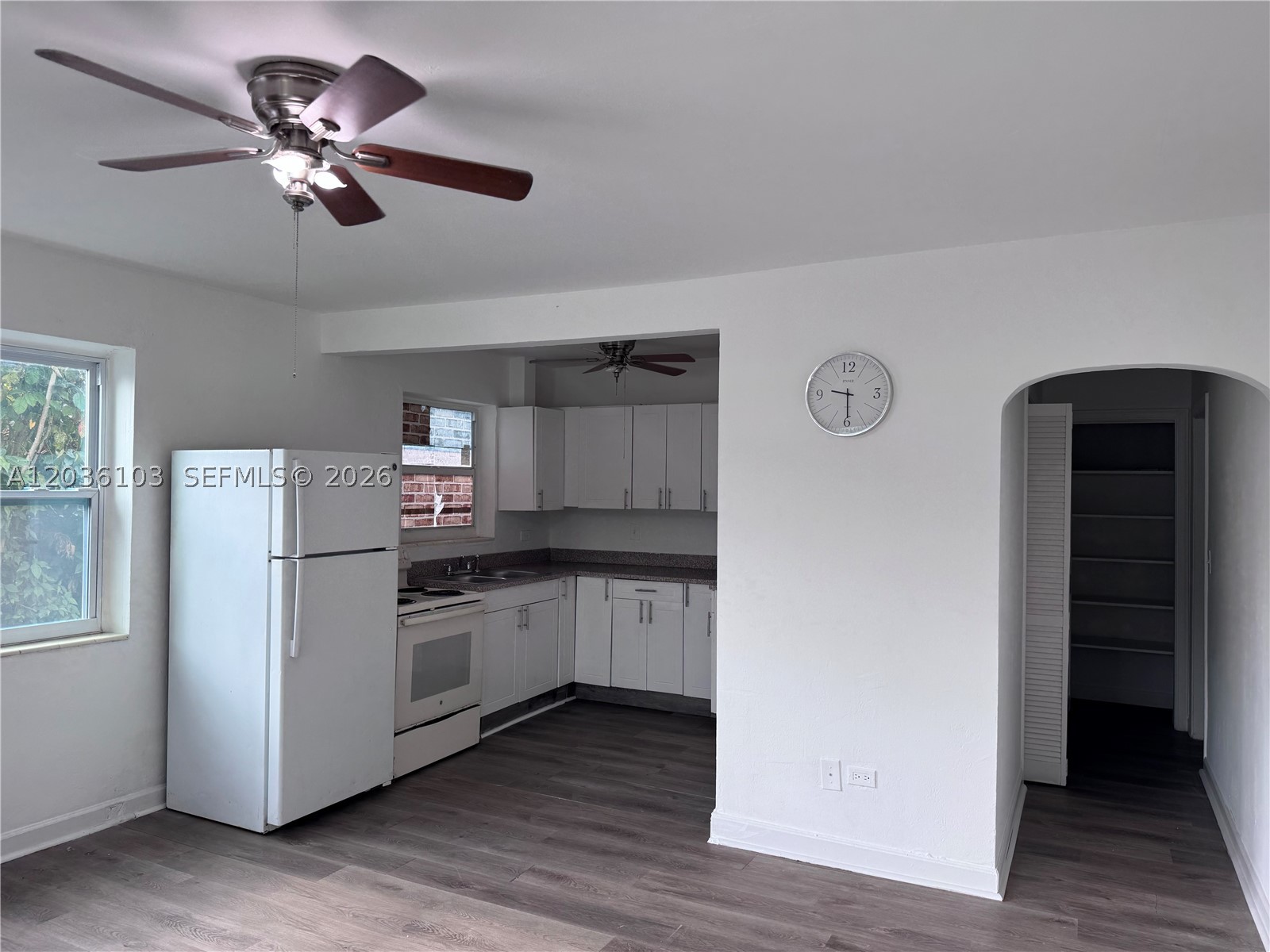 Updated 1BR/1BA unit in a Triplex Move-in ready. Freshly painted in a well kept multifamily building. Features impact windows for  safety, plus laminated flooring throughout. Step outside to a green area perfect for bbq and relax. Parking in front of the property on the street.