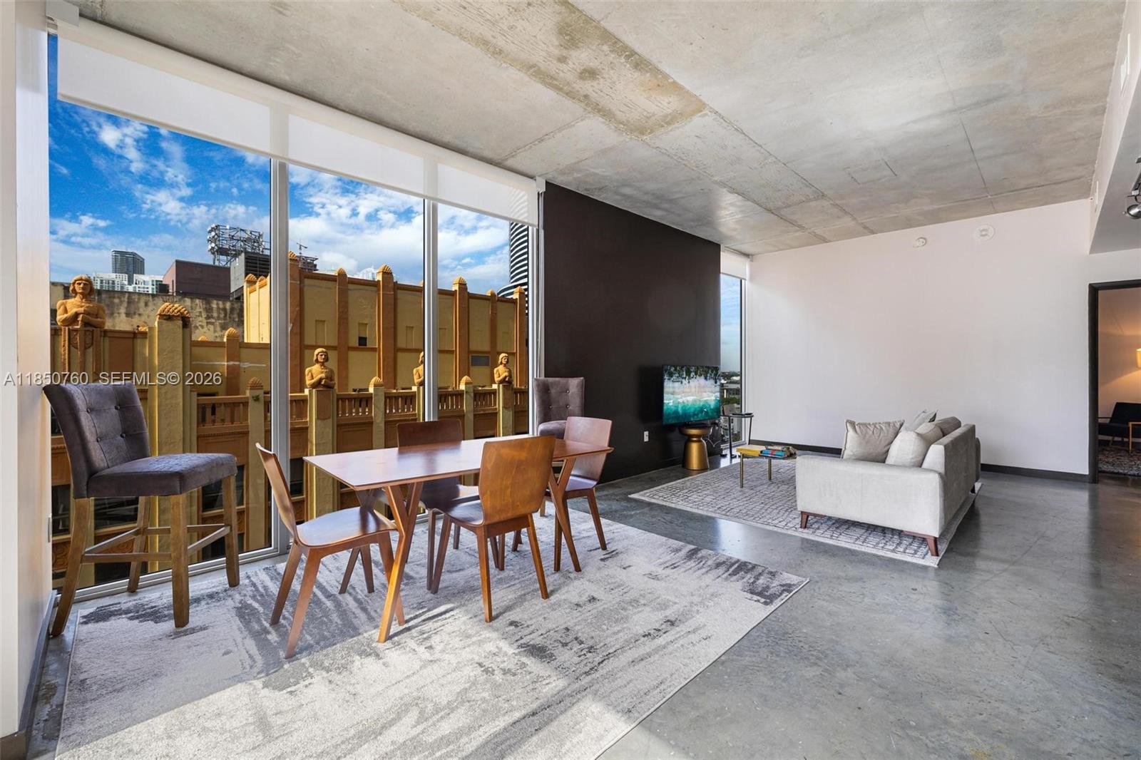 Spacious 2 bed / 2 bath corner loft in the coveted ‘01 line at Centro Condominium. This bright, modern unit features 10-ft floor-to-ceiling windows, private balcony, open kitchen, spa-style baths, polished concrete floors, custom closets, and in-unit laundry.

Images are virtually staged and showcase a similar unit on a higher floor, offering a clear sense of the layout and design. This unit is located on a lower floor.

Centro allows flexible rentals with a 31-day minimum, making it a great option for investors or seasonal use. Full-service amenities include a rooftop pool, gym, sauna, sky lounge, and 24/7 concierge. Walk to Bayfront Park, Metromover, Kaseya Center, and more. Valet and rental parking available nearby.