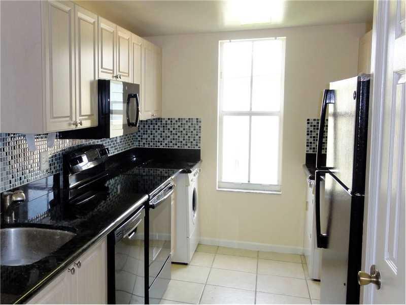 Corner Unit, Top floor, with no upper neighbors, One of the best Units. Very Private with a Lot of Natural Light & a Beautiful View. Brand New Appliances , New Paint and New Carpet throughout.1 Car Garage plus driveway parking, 3rd open room can be an off ice or open Bedroom.