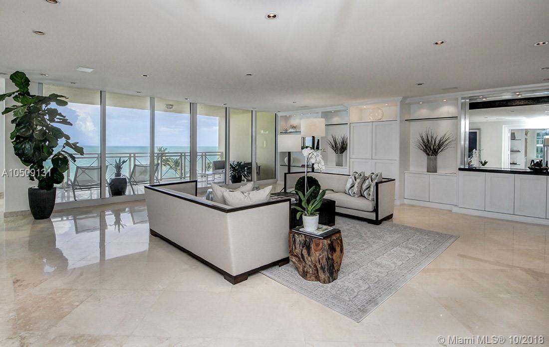 MOST MOTIVATED SELLER. REDUCED BY $1.5M! AND PRICED WELL UNDER MARKET. Enjoy endless water views from this magnificent corner unit with 3,950 SF facing directly the ocean. Unit features private elevator entrance, surround sound system, smart home Creston system, 4 suite bedrooms all with walk in closets and 5 full bathrooms, marble floors throughout, all impact windows and doors, 3 spacious balconies with water views. Exquisitely maintained building offering free valet parking, oversized heated swimming pool and Jacuzzi, tennis court and gym.
