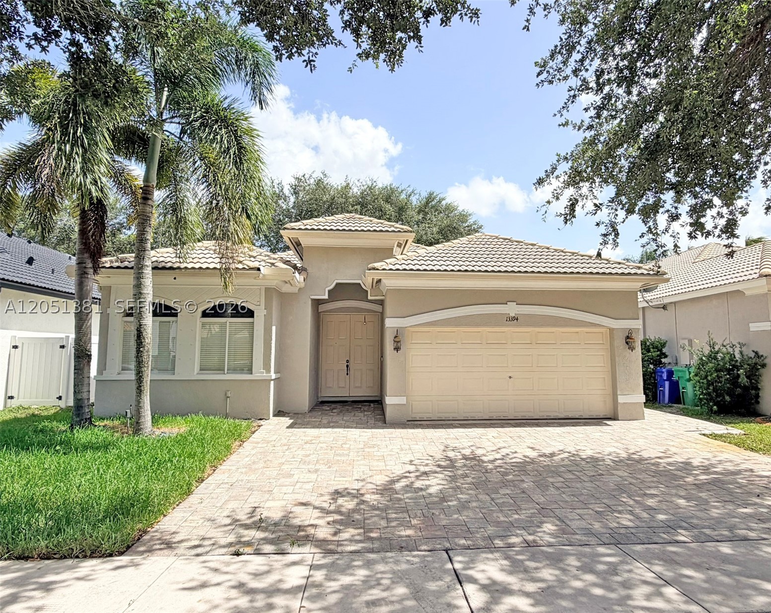 DISCOVER AN EXCEPTIONAL HOME ON A BEAUTIFUL STREET WITHIN THE PRESTIGIOUS POINCIANA SOUTH GATED COMMUNITY AT MONARCH LAKES, IDEALLY LOCATED NEAR MAJOR EXPRESSWAYS, TOP SCHOOLS, POPULAR SHOPS, AND FAVORITE RESTAURANTS. THIS BEAUTIFUL 3 BEDROOM 3 BATH RESIDENCE ALSO FEATURES A VERSATILE BONUS CONVERTED TWO CAR GARAGE, PERFECT AS A BEDROOM, OFFICE, GYM, OR RELAXATION AREA, OFFERING VALUABLE FLEX SPACE FOR MODERN LIVING AND CAN EASILY BE RECONVERTED BACK TO A TWO-CAR FUNCTIONAL GARAGE. STEP INSIDE TO A BRIGHT AND INVITING DESIREABLE INTERIOR SPLIT BEDROOM FLOOR PLAN ENHANCED BY VAULTED CEILINGS AND NEUTRAL TILE FLOORS THROUGHOUT. THE GOURMET KITCHEN BOASTS WHITE CABINETS, GRANITE COUNTERS, AND A CHARMING BREAKFAST AREA ALL OENING TO A BIG FAMILY ROOM WITH VAULTED CEILINGS, CREATING A WARM AND WELCOMING SPACE FOR EVERYDAY ENJOYMENT. ADDITIONAL HIGHLIGHTS INCLUDE WALK-IN CLOSETS, AN INDOOR LAUNDRY AREA, AND A DEDICATED STORAGE ROOM, ADDING CONVENIENCE AND FUNCTIONALITY THROUGHOUT THE HOME. OUTDOOR LIVING IS ELEVATED WITH A STONE PAVER DOUBLE DRIVEWAY, ALONG WITH STONE PAVER REAR AND SIDE PATIOS DESIGNED FOR ENTERTAINING AND RELAXATION. THE FENCED YARD PROVIDES AND INCLUDES A STORAGE SHED FOR EVEN MORE USEFUL SPACE. EXTRAS SUCH AS PADDLE FANS, HURRICANE PANELS, AND ACCESS TO THE COMMUNITY POOL FURTHER ENHANCE TO APPEAL. A RARE OPPORTUNITY TO OWN A STYLISH, SPACIOUS, AND WELL-LOCATED HOME IN ONE OF THE AREA'S MOST SOUGHT AFTER COMUNITIES.