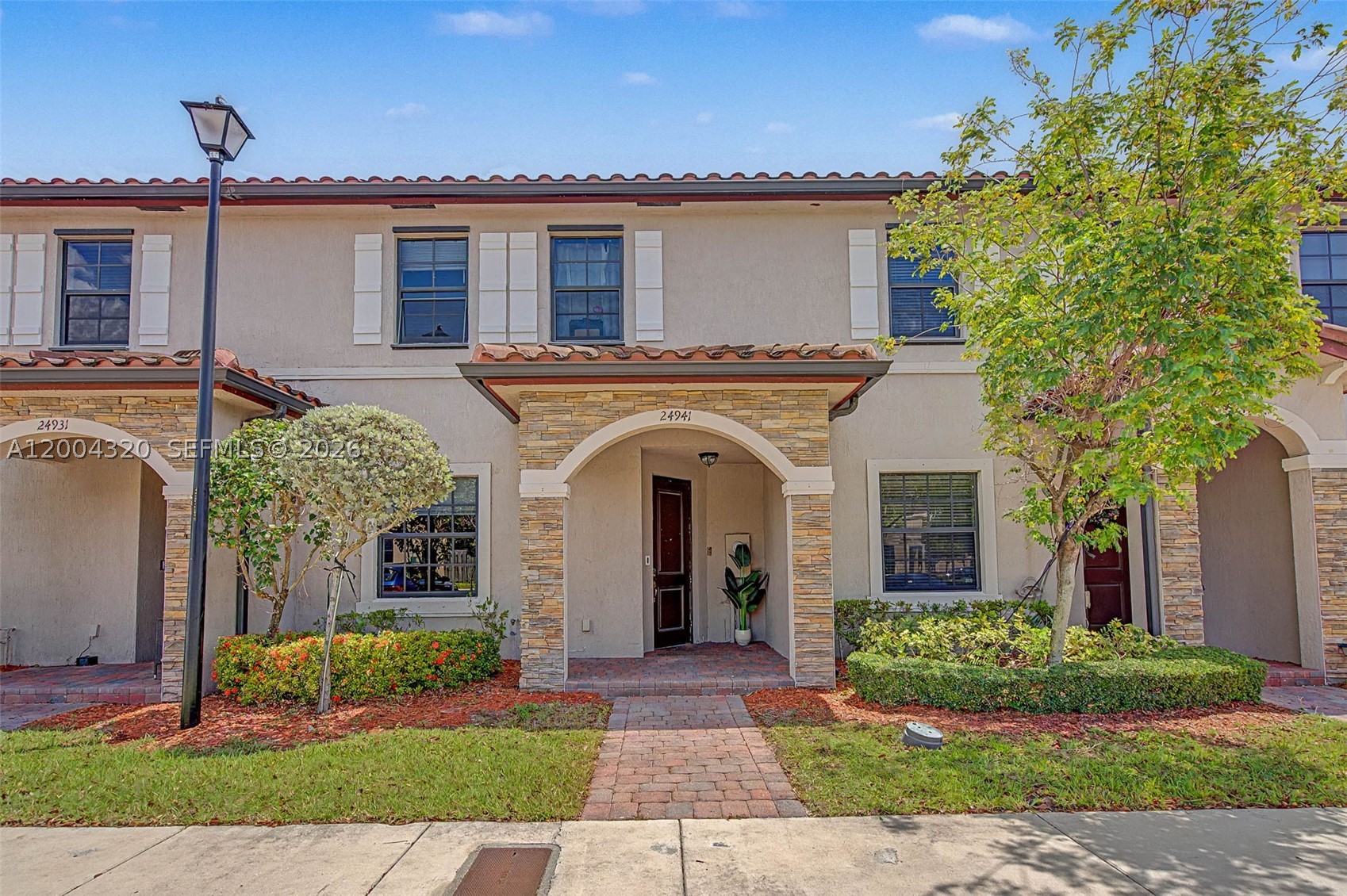 EXCEPTIONAL VALUE...PRICE ADJUSTMENT. Great Buyer opportunity. Seller relocating, ready to accommodate buyers move in timeline. Beautiful 3 bedrooms, 2.5 bathrooms townhouse  in the gated community of Artesa in Homestead. Built in 2017, it offers 1,659 SF; the open-concept floor plan creates a warm and inviting atmosphere perfect for both everyday living and entertaining. The first floor features elegant ceramic tile flooring, while the second level showcases stylish laminate floors.The main level offers generous living and dining areas, a convenient half bath for guests, and seamless flow for family gatherings and social events. The property also includes two assigned parking spaces for added convenience.
Upstairs, you'll find three well-proportioned bedrooms, two full bathrooms, and a conveniently located laundry area with washer and dryer.
Residents of Artesa enjoy an exceptional lifestyle with resort-style amenities, including a modern clubhouse, two sparkling swimming pools, a fully equipped fitness center, a children's playground, and beautifully maintained green spaces. Best of all, the community offers a low and affordable HOA, providing outstanding value.
Ideally situated near shopping centers, restaurants, entertainment, and major highways, this property offers the perfect combination of comfort, convenience, and investment potential.
Don't miss this incredible opportunity—schedule your private showing today!