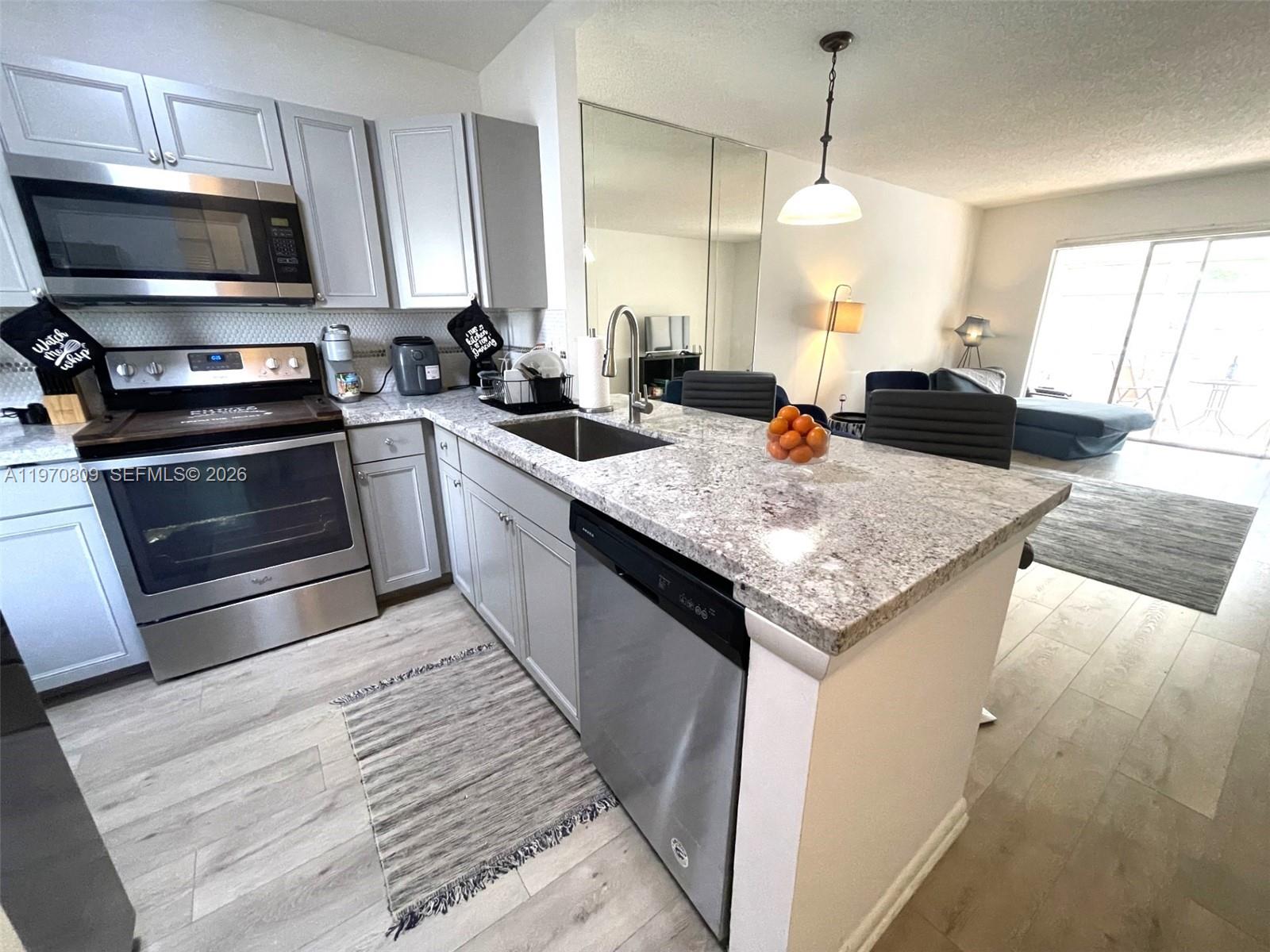 GREAT OPPORTUNITY to purchase this beautiful 2bed/2bath condo on the 3rd floor on Phase 4 of Hawaiian Gardens community. Unit has beautiful and tranquil lake view. This condo has been Renovated with water proof laminated vinyl, open kitchen with new shaker cabinets, granite counters and SS appliances. The main bedroom is spacious and has lots of closet space. Both bathrooms are renovated. The AC is 3 yrs. The building passed certification and has Reserves, new plumbing, recently painted and has new aluminum railing. The most recent assessment has been PAID IN FULL by the seller. This is a 55+ community with lots of activities and amenities such as heated pool, shuffleboard, BBQ area and more. Water and internet are included in the maintenance fee. It comes FURNISHED. Electric charging station available! Easy to show.