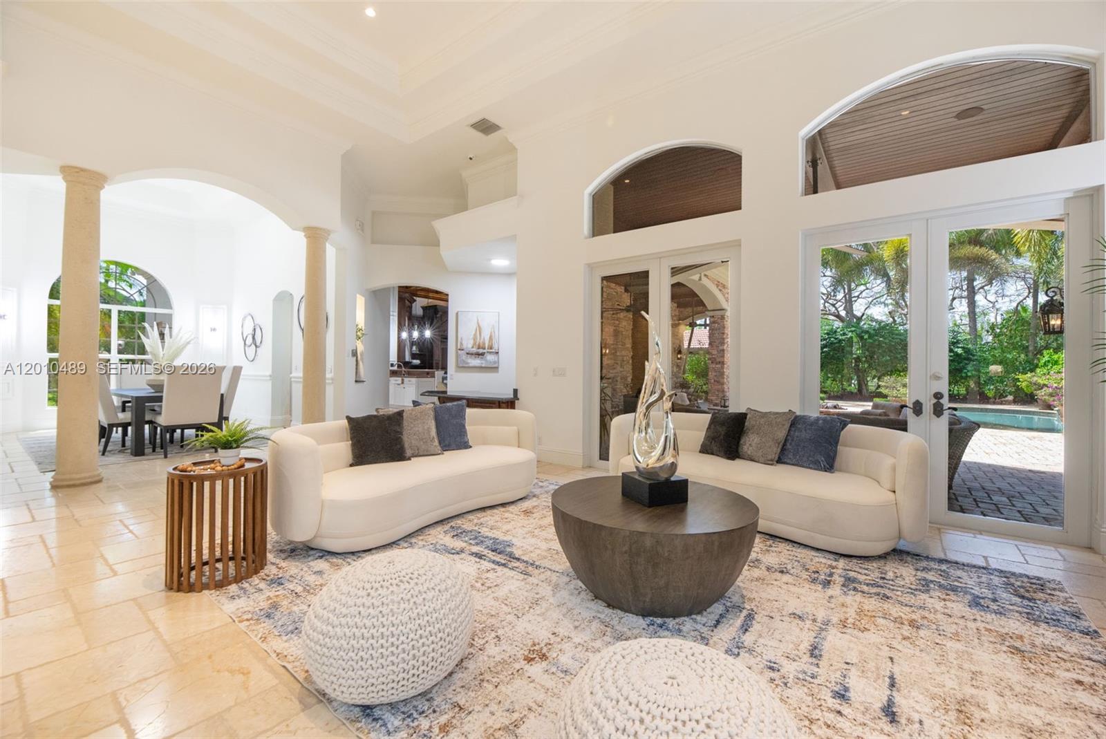 Welcome to a one-of-a-kind move in ready estate located in the prestigious Landmark Ranch Estates of Southwest Ranches. This freshly painted luxury residence offers 6 bedrooms (private maid’s quarters) 7 bathrooms, plus an office/den, perfectly designed for elegant living and entertaining. Situated on over 2 acres, the property is surrounded by lush tropical landscaping, creating a private resort-style retreat. Enjoy expansive outdoor living areas featuring a heated pool, outdoor kitchen, putting green, and plenty of space to relax or host unforgettable gatherings. Inside, custom millwork adds warmth, character, and sophistication throughout. This estate offers impressive scale, privacy, and elegance in one of Broward’s most exclusive communities, known for its grand estates and celebrity neighbors. A rare opportunity to own a truly special home in Landmark Ranch Estates.