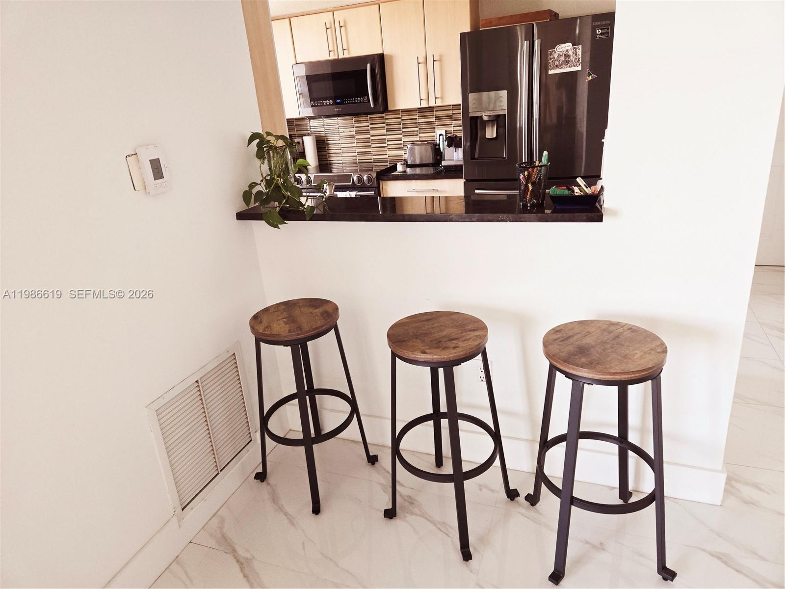See it to believe it !!! this is one of a kind 2/2 corner unit completely and beautifully updated by a professional, new modern doors and Ceramic Floors, brand new air conditioning, top of the line appliances, granite countertops, amazing bathrooms. Amazing baths, Washer & Dryer inside unit. It is a truly a magazine apartment. Water included in rent. Enjoy the beautiful view from balcony and all rooms. The building has beautifully decorated social, billiards and TV rooms, GYM, onsite manager, maintenance crew and security cameras.