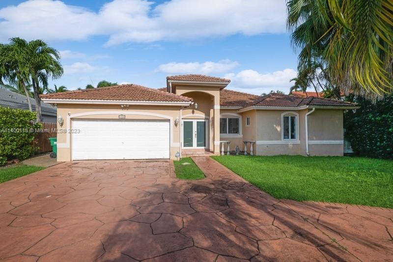 Beautiful and spacious 4 bed/2.5 baths residence in Kendall on a quiet and private cul-de-sac sitting on a 11,055 SQ FT lot. Impact resistance doors and windows. 2 AC Units. Property features large kitchen with ample cabinetry & granite tops, stainless steel appliances, large bedrooms, walk-in-closets, new bathrooms, beautiful tiled flooring, high ceilings. Family Room overlooking covered terrace and large pool for entertainment. Spacious yard with ample space for a Summer kitchen, RV and or boat. Tiled two car garage and Circular driveway for extra parking convenience. No HOA. Close to great Schools, Turnpike, Shopping Centers and Restaurants. Prime Location!
