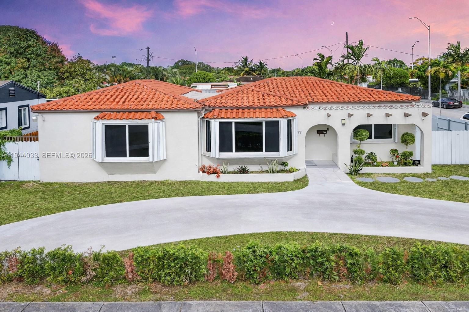 Charming and spacious Corner home 2483 sqft centrally located Less than 5 minutes to FL-112E and 10 minutes to the Airport. This 5 bedroom 3 and a half bath home has light neutral colors throughout with lots of windows bringing the outside in. Lots of upgrades new A/C unit and air ducts, new out door fence, updated floors and bathrooms, hurricane impact windows, new water heater. Great for entertaining! Large Florida room high-ceiling that opens to cemented patio-garden that leads to pool area. Efficiency with own entrance. If you like to swim this home is for you with a large 9 ft deep pool for lots of fun in the sun. Rooms are spacious with ample closets and storage. Kitchen has granite counter tops and stainless-steel appliances. Plenty of parking space and a circular driveway.  House is Sold in As Is Condition. Call listing agent for showing instructions.