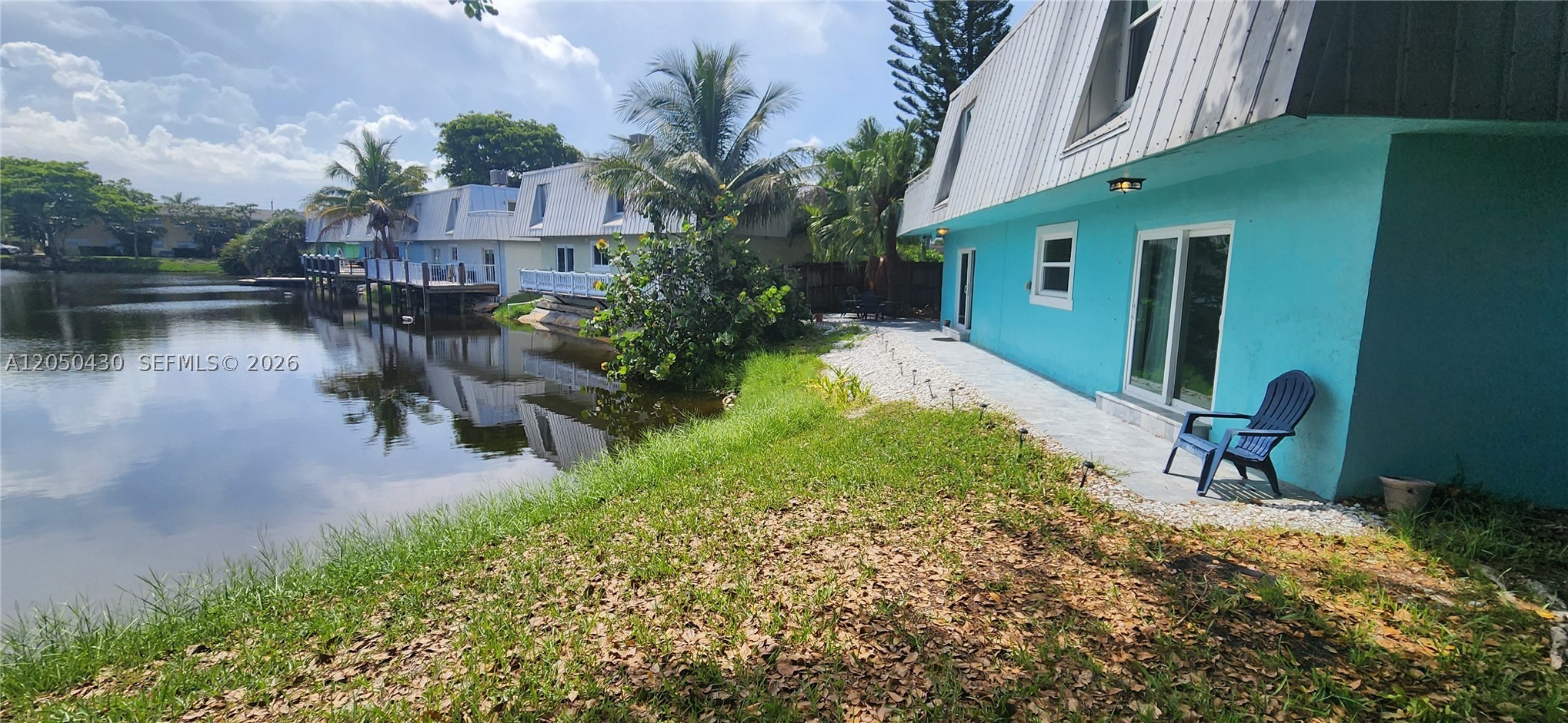 Welcome to this beautifully updated 2-bedroom, 2-bath home nestled along a peaceful pond in one of Oakland Park’s most desirable neighborhoods. Offering approximately 1,480 square feet of living space, this unique two-story residence features spacious living areas, impact windows and doors, an open loft with rooftop access, and serene water views that create the perfect setting to relax and unwind. Step outside to a fully fenced backyard, ideal for entertaining, enjoying the outdoors, or giving your pets room to play. The property also offers ample parking with space for up to six vehicles and access to the community pool. Conveniently located just minutes from Oakland Park’s popular Culinary Arts District, you’ll be close to local favorites including Funky Buddha Brewery and a variety of restaurants and entertainment. Wilton Drive, Lauderdale-by-the-Sea, Fort Lauderdale Beach, Las Olas Boulevard, and Downtown Fort Lauderdale are all just a short drive away. With quick access to I-95, US-1, and Oakland Park Boulevard, commuting throughout South Florida is easy. This home offers the perfect combination of privacy, convenience, generous parking, and an unbeatable location.