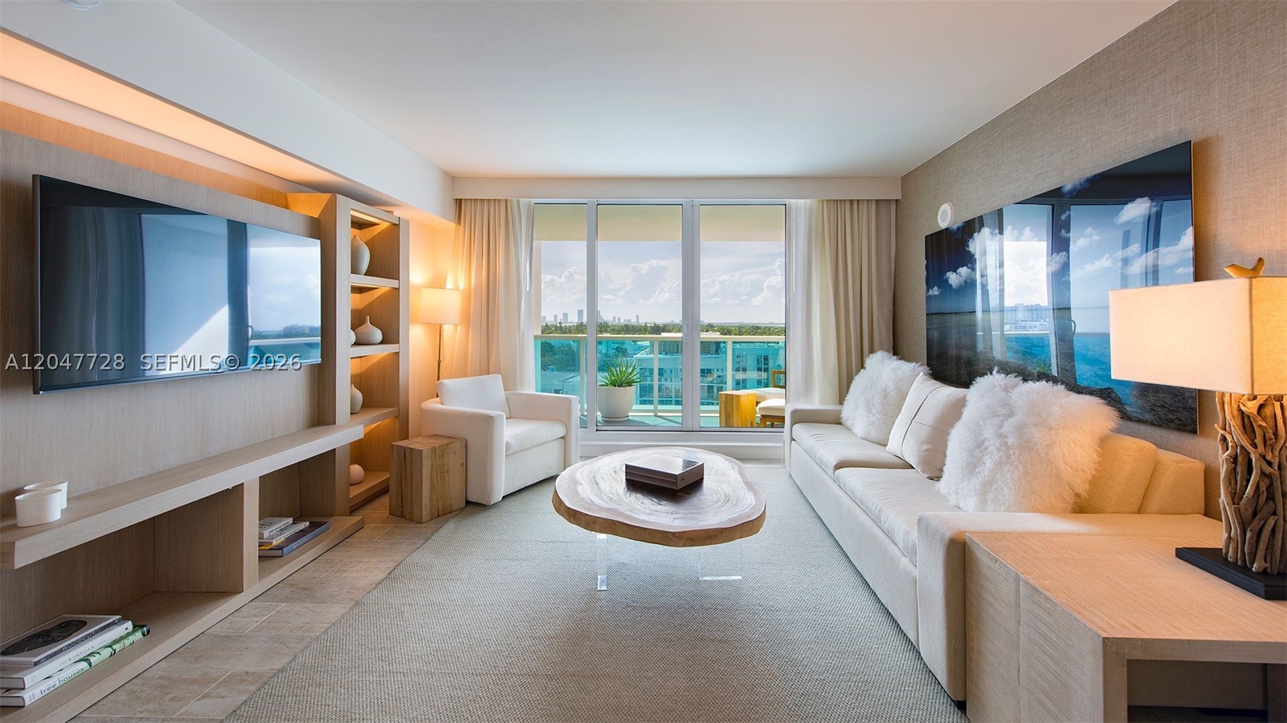 his gorgeous 1,239 Sq. Ft. 2 bedroom condo is located at 1 Hotel & Homes South Beach. Enjoy views of the Miami Skyline from your own private balcony with a double chaise lounge and a table set for two. Living room is spacious and relaxing when your lounging on the plush organic sofa that converts into a queen bed. 

Master bedroom has a king-sized  mattress . Shower steam heads, oversized soaking tub and more...

The space:
2 bedroom | 2 bathroom, 1,305 Sq. Ft. (121 Sq. Meters).

Please!! Note that the MLS listing price applies to the low season months of August and September only !!!!

There is a mandatory Daily Resort for all reservations under (30) days. This fee is also paid directly to the hotel once at the resort.

King bed in master bedroom. Queen bed in second bedroom.

Fully stocked kitchen to include pots and pans, dishwasher, refrigerator, oven.
Full washer & dryer with laundry detergent and dryer sheets.

Luxurious amenities provided in bathrooms.

High speed private Internet, TV's in all bedrooms and living room areas.

City and Intracoastal Views.

Guest access
Guests have access to all amenities at the hotel just as if they were staying directly through the hotel. To include use of all the pools, restaurants, gym, spa...