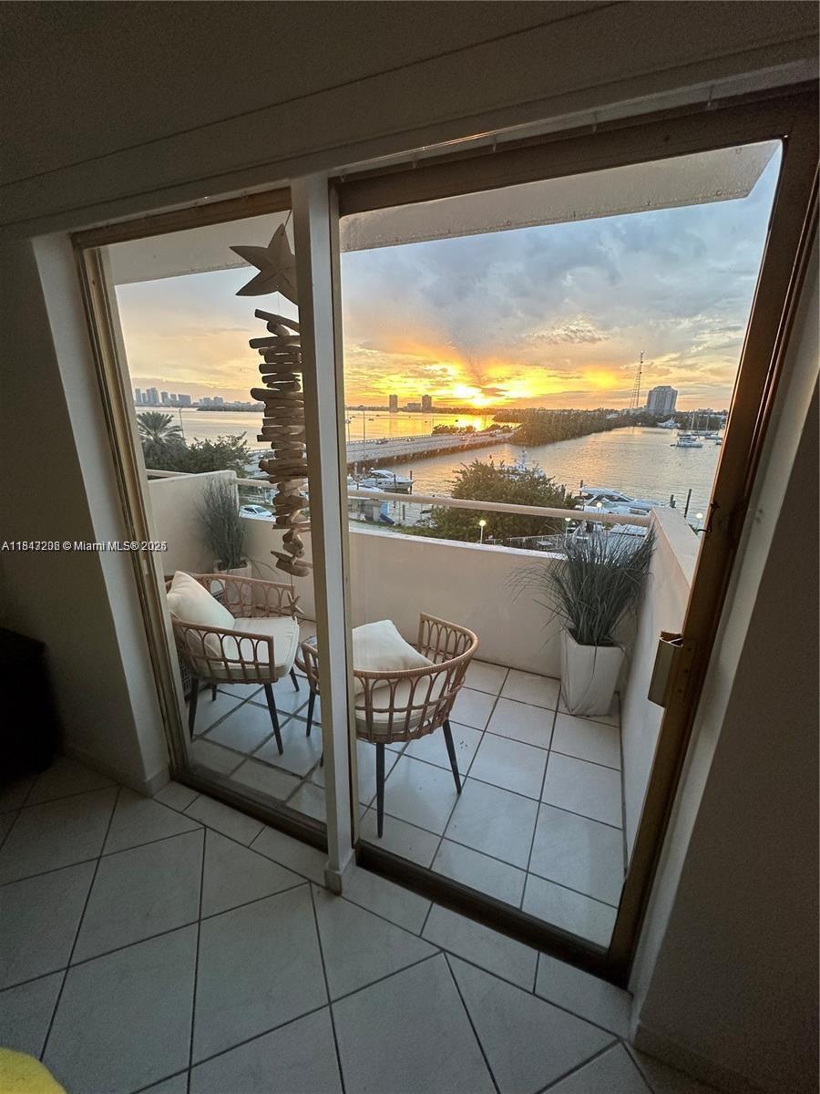 Are you curious about the impact that a daily view of a bay can have on your well-being? Well, wonder no more! An incredible opportunity has arrived for you to own a waterfront condo in North Bay Village, where the association allows short-term rentals - a rarity in this area. This 1-bedroom, 1-bathroom gem in this building is eagerly awaiting its next owner. If you've always dreamed of living the Village lifestyle, with convenient access to shops and restaurants, this is your chance. Alternatively, if you're looking to make a smart investment with great short and long-term potential, this is the perfect opportunity. It's easy to schedule a showing, and rest assured, it won't disappoint.