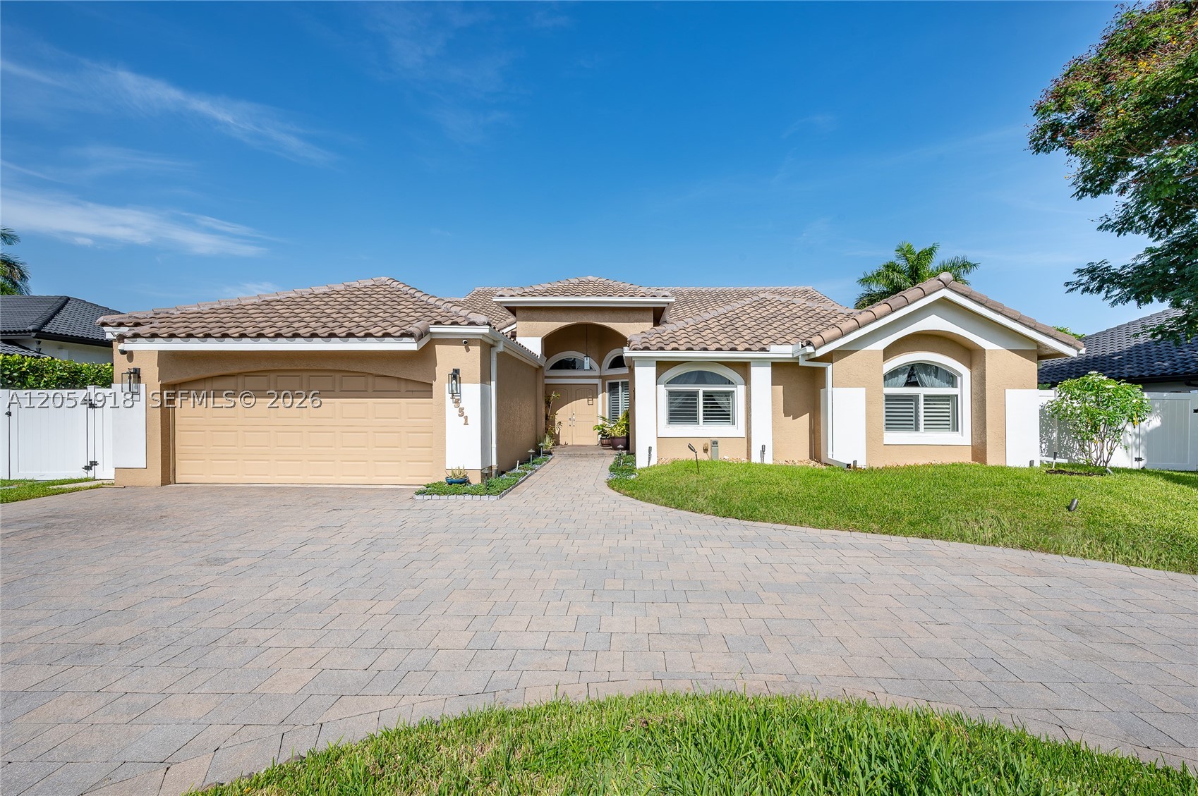 Welcome to a stunning 4-bedroom, 3-bath pool home that perfectly blends luxury, comfort, and functionality. This beautifully updated residence features a desirable split floor plan, soaring ceilings, impact windows and doors, a new 2024 roof, plantation shutters, porcelain and engineered wood flooring, and a spacious gourmet kitchen with premium appliances and custom cabinetry.

The private backyard is an entertainer's dream with a sparkling pool featuring a gorgeous pool deck, covered lanai, outdoor shower, and a fully equipped summer kitchen with BBQ area. Additional highlights include a two-car garage, paver circular driveway, his-and-hers walk-in closets, video surveillance system, fully fenced yard, and parking for a boat or RV—all with NO HOA!!!

Ideally located near Plantation Walk, Broward Mall, top-rated schools, parks, golf courses, dining, shopping, and major highways, providing easy access to Fort Lauderdale Airport and the area's beautiful beaches.

A rare opportunity to own a move-in-ready South Florida oasis in one of Plantation's most desirable locations! Easy to Show!