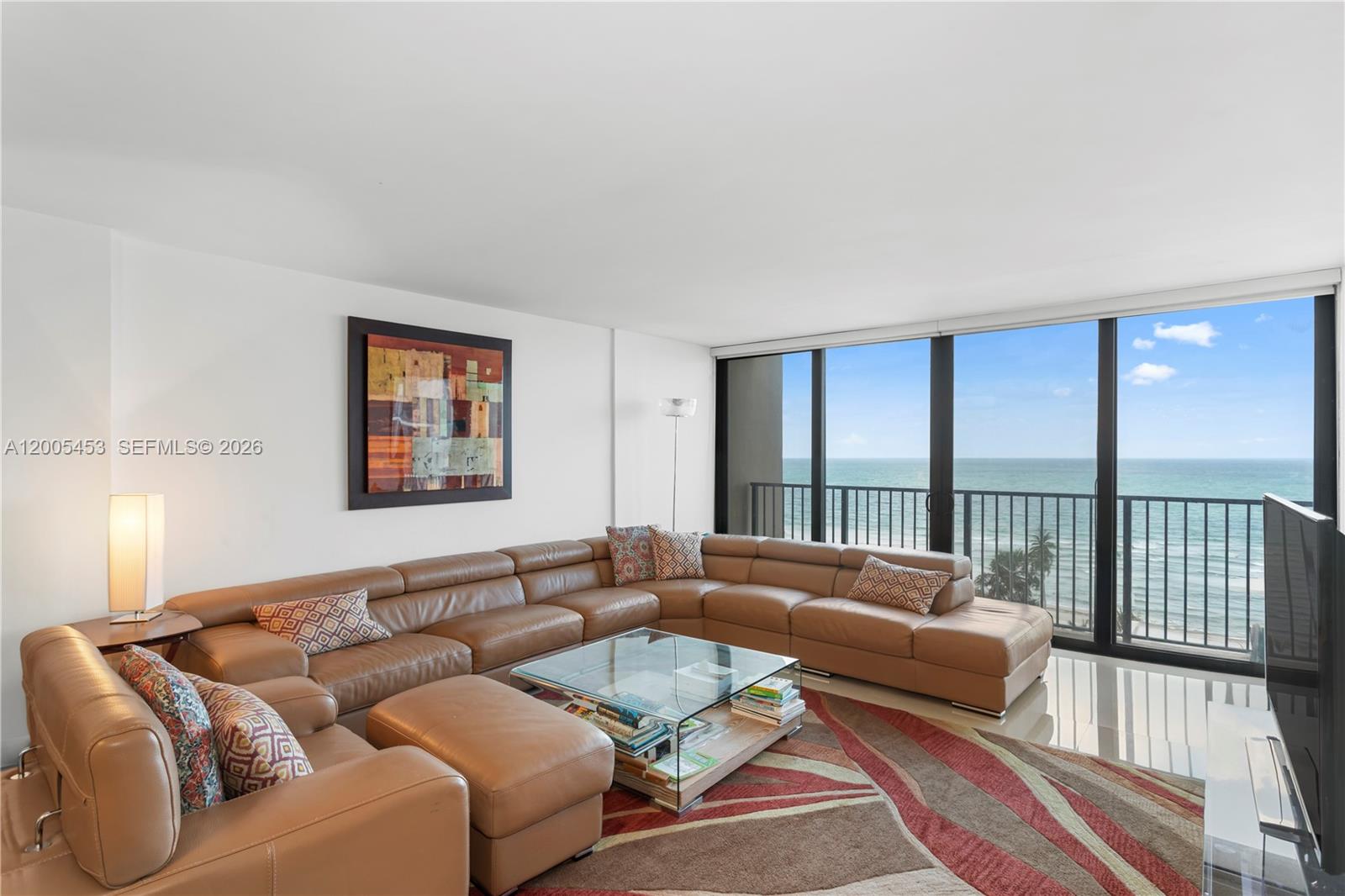 Priced to Sell!!  Ocean View Corner!! One of a kind, stunning and bright totally remodeled spacious oceanfront condo!. Open kitchen w/ granite countertops, stainless steel appliances, quality finishes, beautiful upgraded bathrooms with custom vanity and large glass enclosed showers with stone flooring, stylish light fixtures. Impact windows and a large balcony— perfect for ocean breezes. Located in The Quadomain, a premier resort community. Enjoy beach service, 24/7 security, two pools, two fitness centers, a restaurant, fitness classes, beauty salon, business center, and more. This oceanfront gem is ready to become your home!