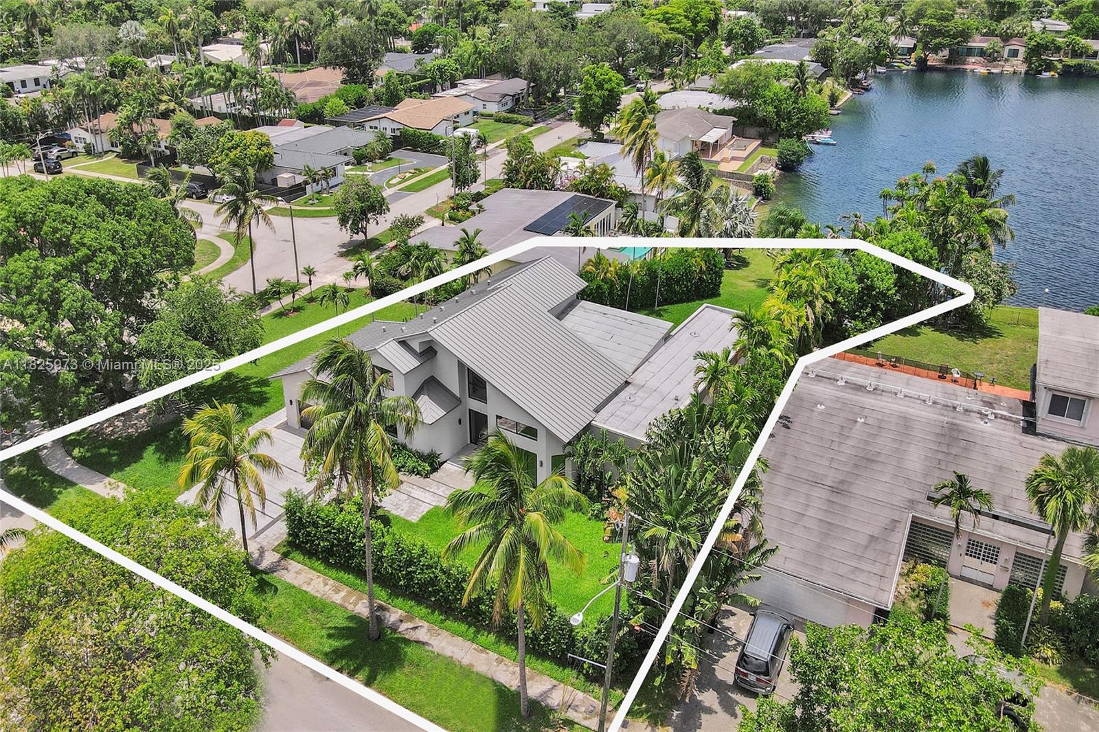 Rare opportunity in coveted Skylake! This fully renovated, ultra-luxurious lakefront estate offers 5,241 SF of exquisite living space on an oversized 17,600 SF lot one of the best parcels available in the neighborhood. Featuring soaring ceilings, a flawless open layout, and 8 spacious bedrooms and 5.5 bathrooms and Colectania kitchen, every detail has been thoughtfully curated with the highest-end finishes. Expansive indoor and outdoor entertaining areas flow seamlessly to a private backyard with direct lake access. The property also includes an oversized garage with space for 2 cars and 4 uncovered plus a separate enclosed room, ideal for a home office, workshop, etc. Truly a turn-key masterpiece in one of Miami’s most desirable. Brand new house built in 2023.