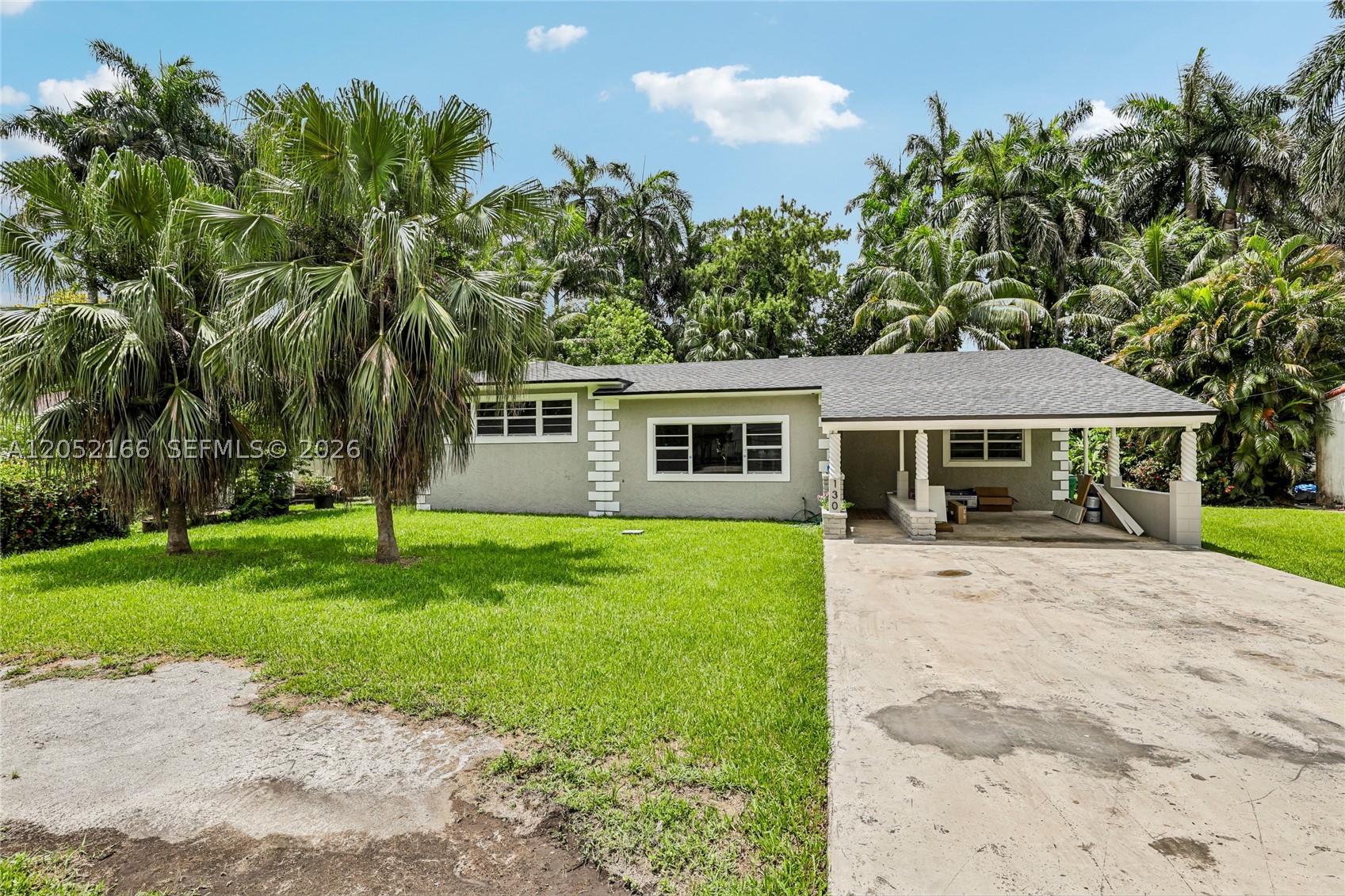 Renovated 2/2 on a huge 11,000 SF lot in unincorporated Miami-Dade, minutes from El Portal, Miami Shores, and The Citadel. One flat rent covers it all: power, water, internet, pest control, and lawn care included at $3,900/month. Bright open living and dining flow into an updated kitchen with shaker cabinetry, butcher block counters, and stainless steel appliances. A spacious guest bedroom and renovated full bath sit on the main level. Up a few steps, the split-level primary suite is the showstopper: two bedrooms were combined to create one oversized private retreat with abundant closet storage including a walk-in, and a newly renovated bath with dual vanities and a walk-in shower. Full-size washer and dryer in the attached laundry room off the covered patio. Covered carport plus a long private driveway and massive yard with plenty of room for a boat, work truck, or multiple vehicles. EV charging can be installed upon request. Quick access to I-95, the Design District, Wynwood, and the beaches. Every detail matters when it's your move. Schedule your showing today!