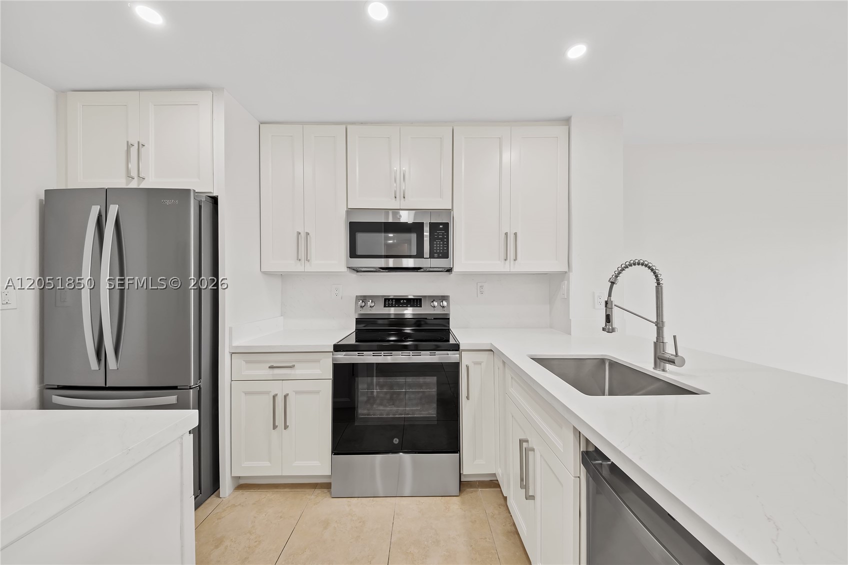 Beautifully updated and one of the finest units in the area! This spacious, fully tiled residence features a secure call-in entry system, ample parking, and is located within an excellent school district. Enjoy the convenience of being within walking distance of Dadeland Mall, the Metrorail, and just minutes from the University of Miami.  The community offers an outstanding selection of amenities, including a swimming pool, tennis courts, clubhouse/community room, playground, and beautifully maintained grounds. Take a relaxing jog or stroll along the scenic canal surrounded by lush green space.  Enjoy full access to all building amenities. Whether you're looking for a primary residence or an outstanding investment opportunity, this property offers an unbeatable combination of quality, value, and location.  Great Property. Great Price. Great Location. An Exceptional Opportunity!