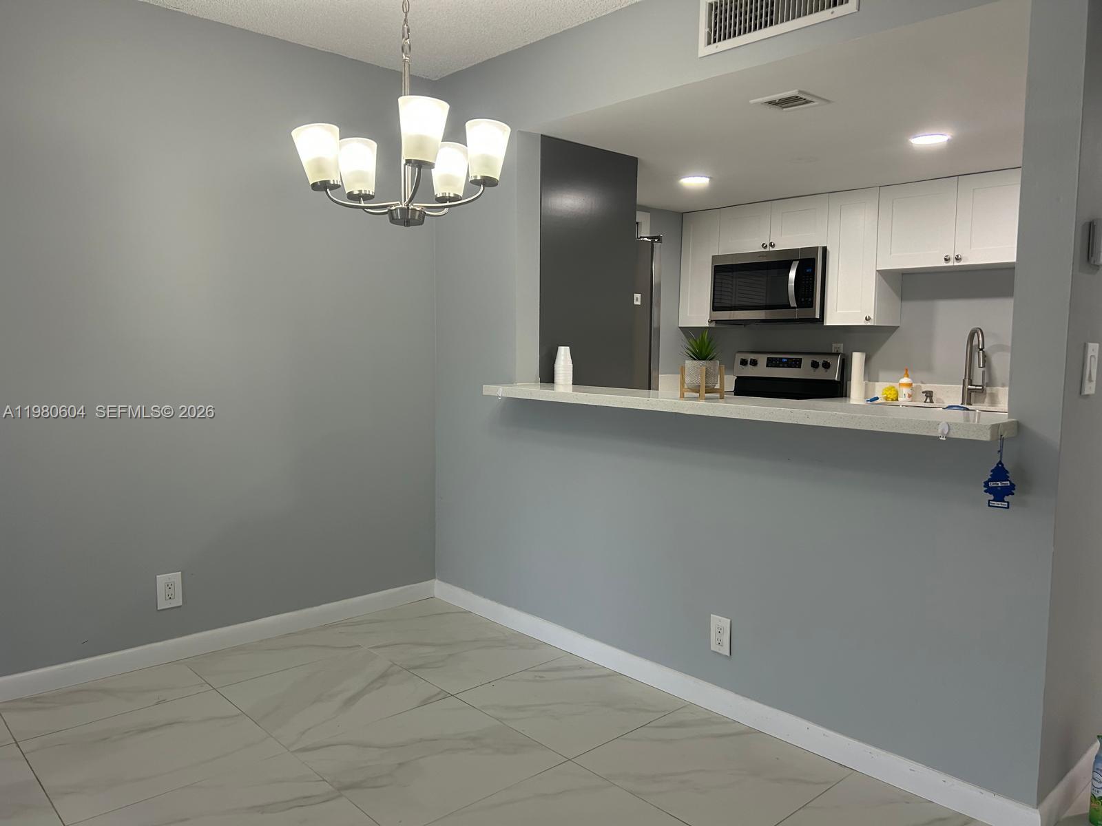 2-Bed, 2-Bath Apartment in Weston! Bright and airy unit with ample bedrooms, a remodeled bathroom, new kitchen w/ new appliances. Newer A/C system for your comfort. The building features a secure lobby with intercom entry, an elevator for easy access, and a refreshing pool. Access to the Bonaventure Town Center Club for only $470 a year, offering amenities like tennis, a gym, sauna, pools and more. Large Washer & Dryer in Unit. NO SPECIAL ASSESSMENTS (all paid). You CAN RENT the unit after 3 months of buying it.