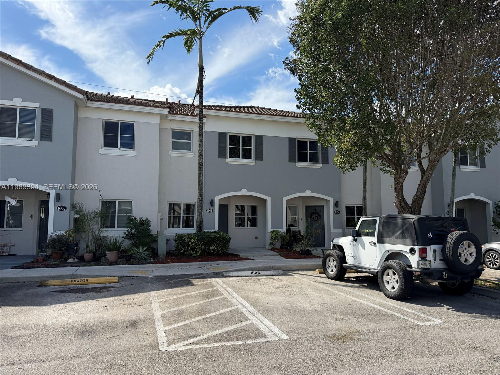 Nice and spacious 2 bedroom/2.5 bath fee simple townhouse located in Venetia Grove gated community with swimming pool.  Living, dining, family room, 1/2 bath and kitchen on first floor.  Two bedrooms/two baths on second floor.  Nice backyard.  Tiled kitchen/baths and laminate in main living areas and bedrooms.  Assigned parking space and plenty of guest parking.  Venetia groves is in close proximity to Florida's Turnpike, shopping and restaurants.