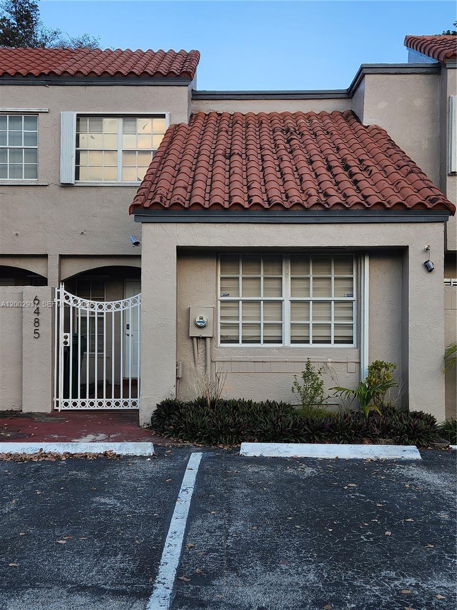Great fully upgraded Townhouse in Sunset Harbour in Kendall! This comfortable 3 bedroom & 3 full bathroom offers a downstair Bedroom with a full bathroom, a very spacious living/dining area, updated kitchen complete granite countertops, wood cabinetry & SS appliances. The two bedrooms upstairs have a full bathroom each. Tile floor. Upgraded hurricane shutters. Nice patio with covered Terrace. Common areas, such as pool, tennis, racket courts, & clubhouse. There are 2 assigned parking spaces right in front of unit, plus plenty of guest parking nearby. The backyard patio is wonderful & very private, near schools, shopping center, restaurants, major expressways. Come see it!
