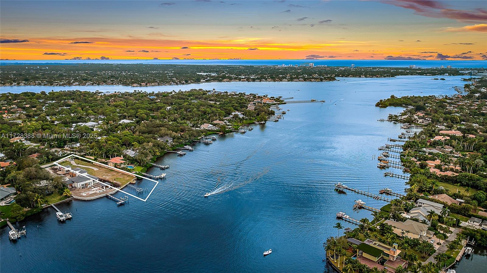 Here's a rare chance to own a waterfront lot on one of Jupiter's most desirable streets. Situated on Pennock Point, this property offers approximately 114 feet of water frontage with stunning, unobstructed water views, and views of the Jupiter Lighthouse. With no fixed bridges and easy ocean access, it's perfect for anyone who loves being on the water. The lot is cleared, filled, and graded, setting the stage for your future vision. Pilings are already in place, making it dock-ready, and a 10,000 lb boat lift has been installed to accommodate your boating needs.
