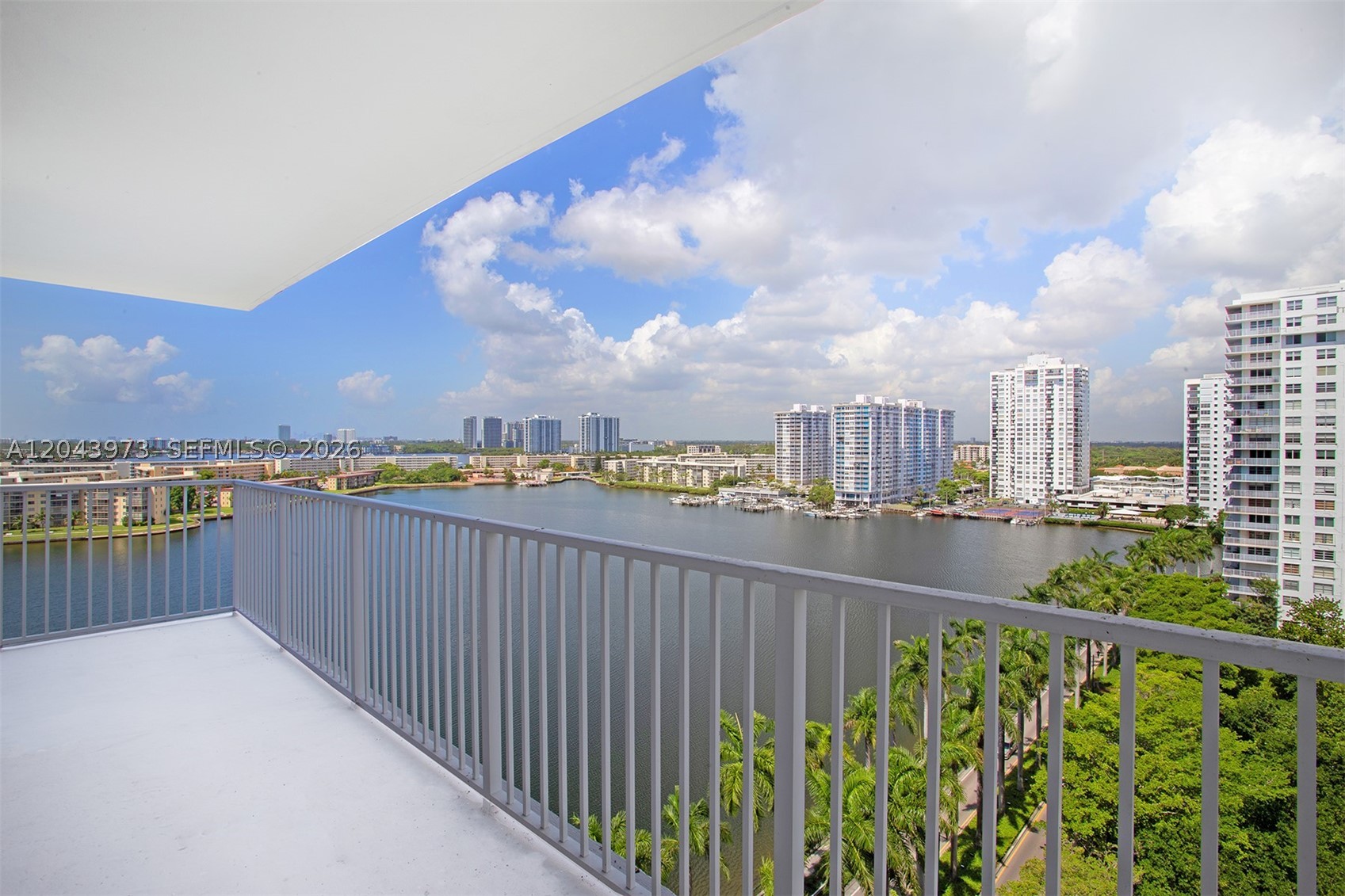Experience the ultimate South Florida lifestyle in this expansive condo, nestled in the heart of beautiful Aventura. Boasting spectacular, unobstructed views of the Intracoastal, this unit features an unmatched wraparound balcony perfect for morning coffees or evening sunsets. Situated in a secure building within a serene, quiet neighborhood, Admirals Port offers resort-style amenities including tennis courts, a fully equipped gym, and a private library. You're just minutes away from world-class shopping at Aventura Mall, lush parks, and top-tier dining.